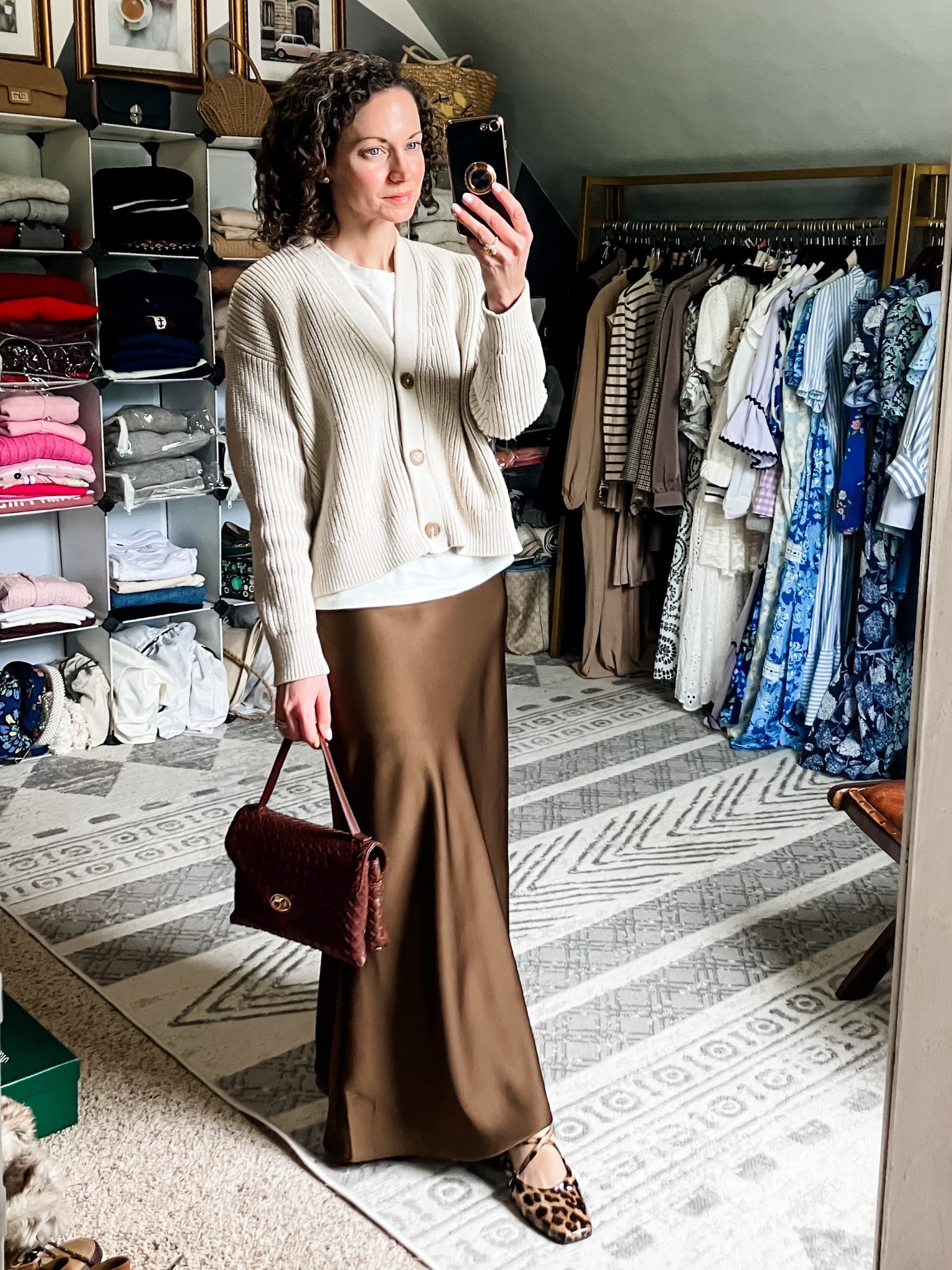 A brown and cream outfit for spring!
Cream cotton cardigan from Quince. 
White T-shirt from Amazon. 
Brown satin maxi skirt from Amazon. 
Diamond stud earrings from Amazon. 
Brown woven handbag from Moda Luxe. 
Leopard ballet flats from Marc Nolan. 
Petite outfit. Spring outfit. Neutral outfit. Classic outfit  

#LTKootd #LTKdayinmylife #LTKOver40