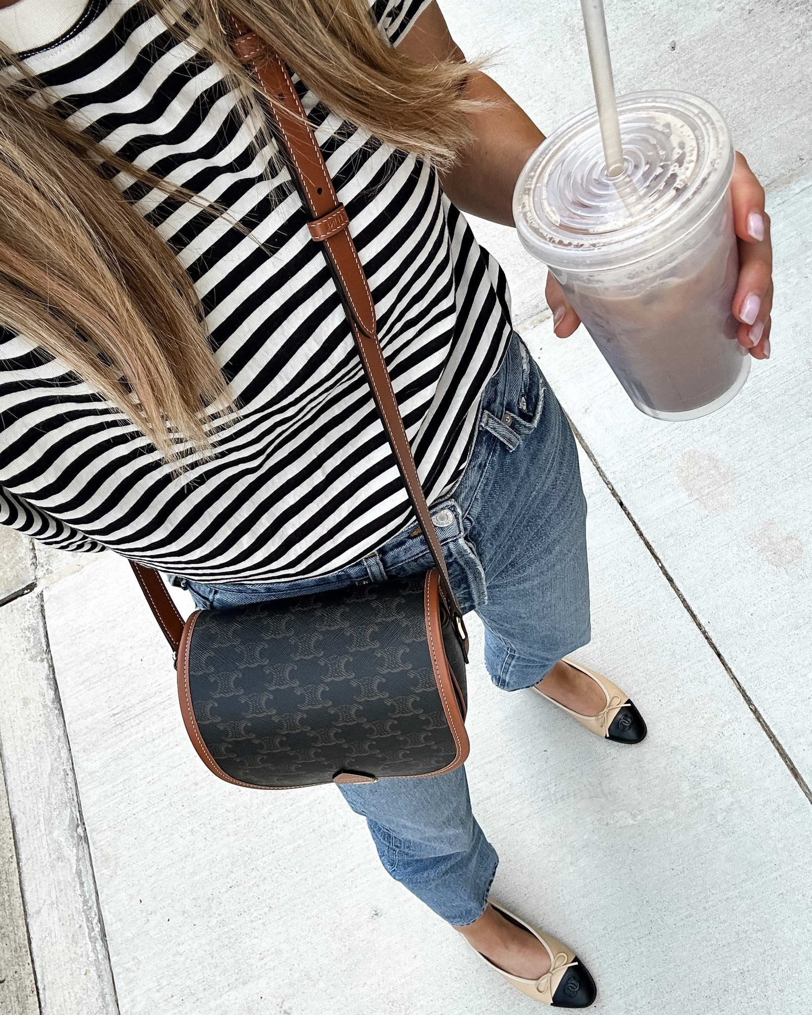 Fashion Jackson wearing striped tee (small) linked similar. AGOLDE jeans, Chanel ballet flats (linked similar) Celine handbag #fashionjackson #jeans #stripedtshirt #balletflats

#LTKunder100 #LTKshoecrush #LTKstyletip
