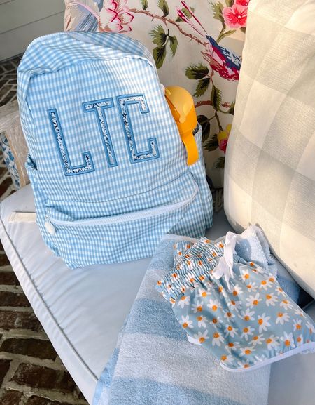 Daisy baby boy swim trunks, gingham, wipeable backpack, striped beach towel, spill proof sippy cup. 

#LTKswim #LTKunder50 #LTKfamily