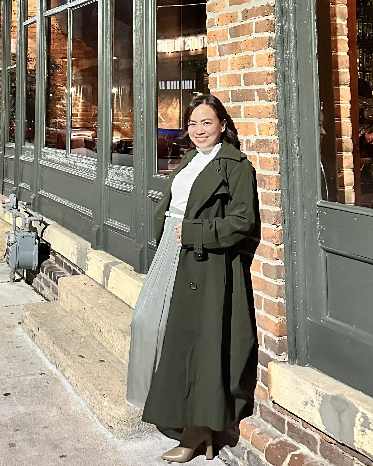Embrace timeless sophistication with a white mock neck shirt paired elegantly with a flowy maxi skirt cinched at the waist with a crisp white belt. Layer on a long trench coat for a touch of chic flair and complete the look with nude pointed toe boots, exuding effortless grace and style.

#LTKstyletip #LTKfindsunder50