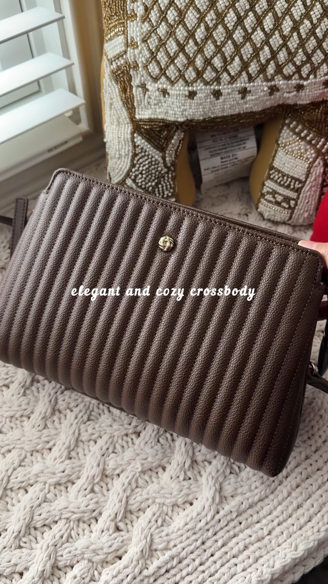 Spotted this elegant, cozy crossbody today and honestly, I couldn’t resist, immediately purchased. It’s simple, but it somehow elevates every everyday look. The inside is so functional: a double compartment, a zipper pocket on one side, and two pockets on the other. I’ve already turned it into my everyday bag. Perfect for errands, brunch with friends, and so much more! ✨👜

#LTKdayinmylife #LTKootd #LTKGiftGuide