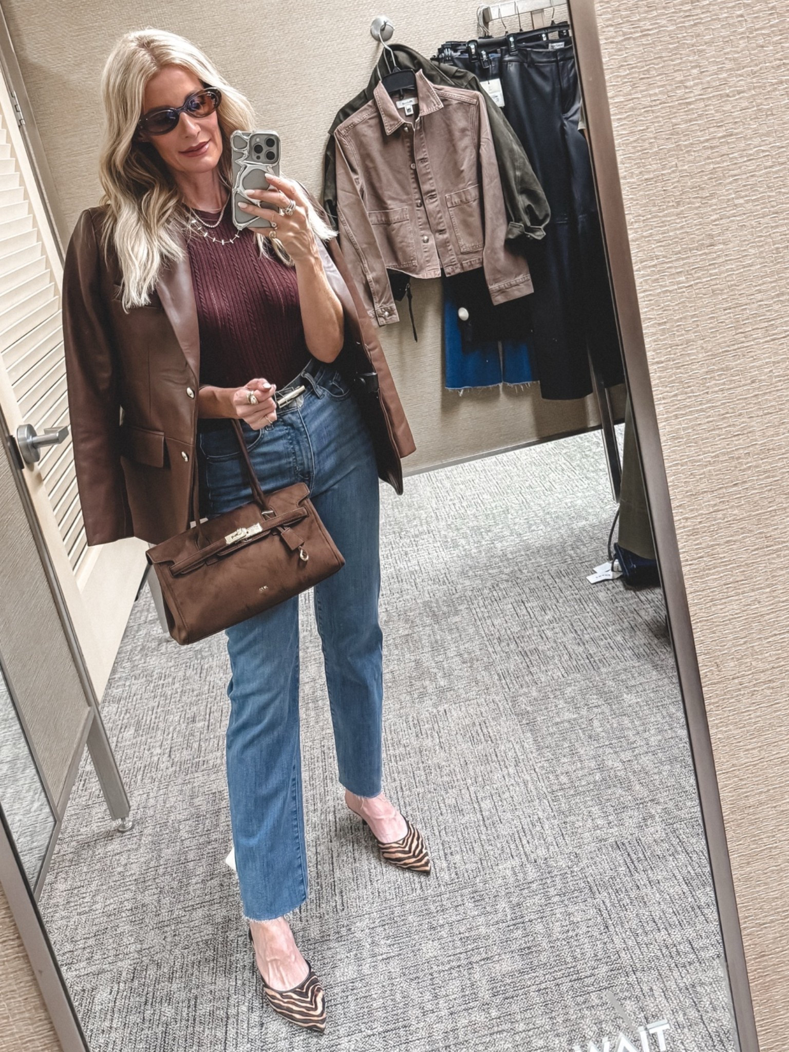 Entire look is part of the Nordstrom Anniversary Sale. ✨ This Rag & Bone chocolate brown leather blazer is absolutely stunning layered over this sleeveless burgundy top. I love the rich mix of burgundy and chocolate brown paired with these Frame high-rise straight-leg jeans—they are so incredibly flattering. I’m wearing an XS in the top and jacket and a size 24 in the jeans.

#LTKootd #LTKOver40 #LTKSaleAlert