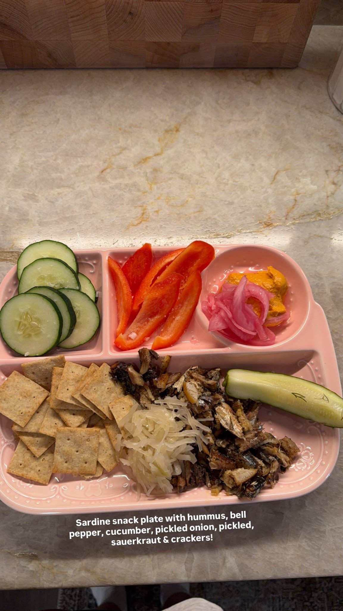 Sardine snack plate with hummus, bell pepper, cucumber, pickled onion, pickled, sauerkraut & crackers!

#LTKfoodie #LTKHome #LTKdayinmylife