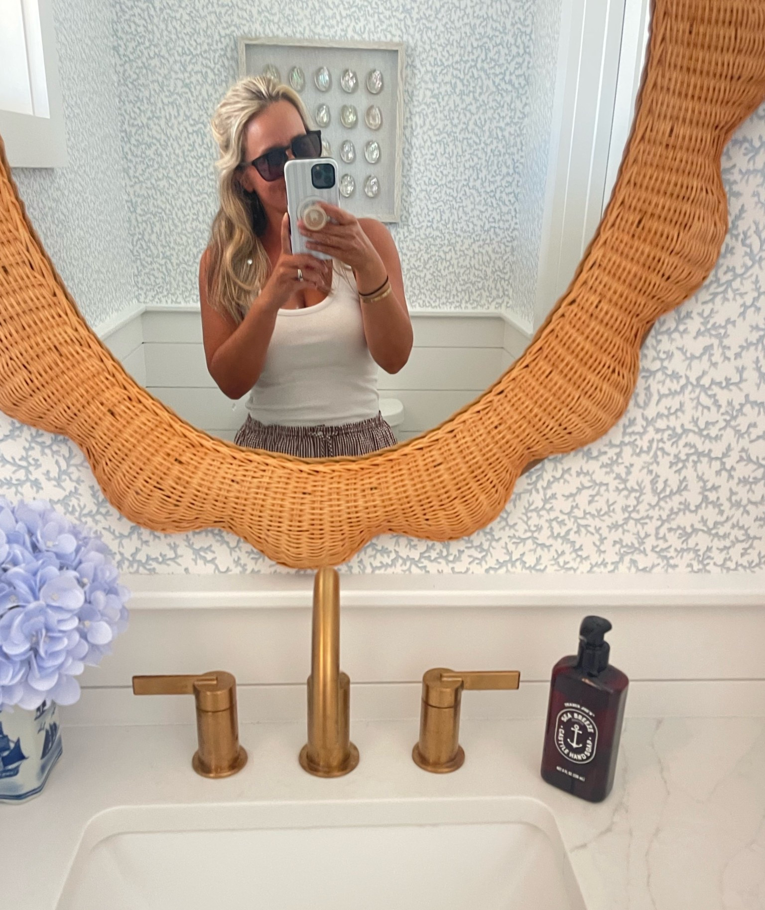 Just saw our powder room wallpaper is now 35% OFF! 🙌🏻 it’s such a beautiful petite print!! 🤍

Art was an in store HomeGoods find, blue ship vase was a thrift find!

#LTKHome #LTKSaleAlert