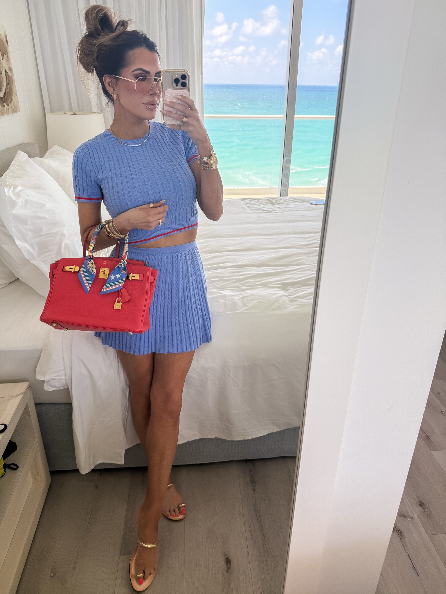 Wearing size small in skirt and top! It’s comfy. I would size up half a size in shoes! 