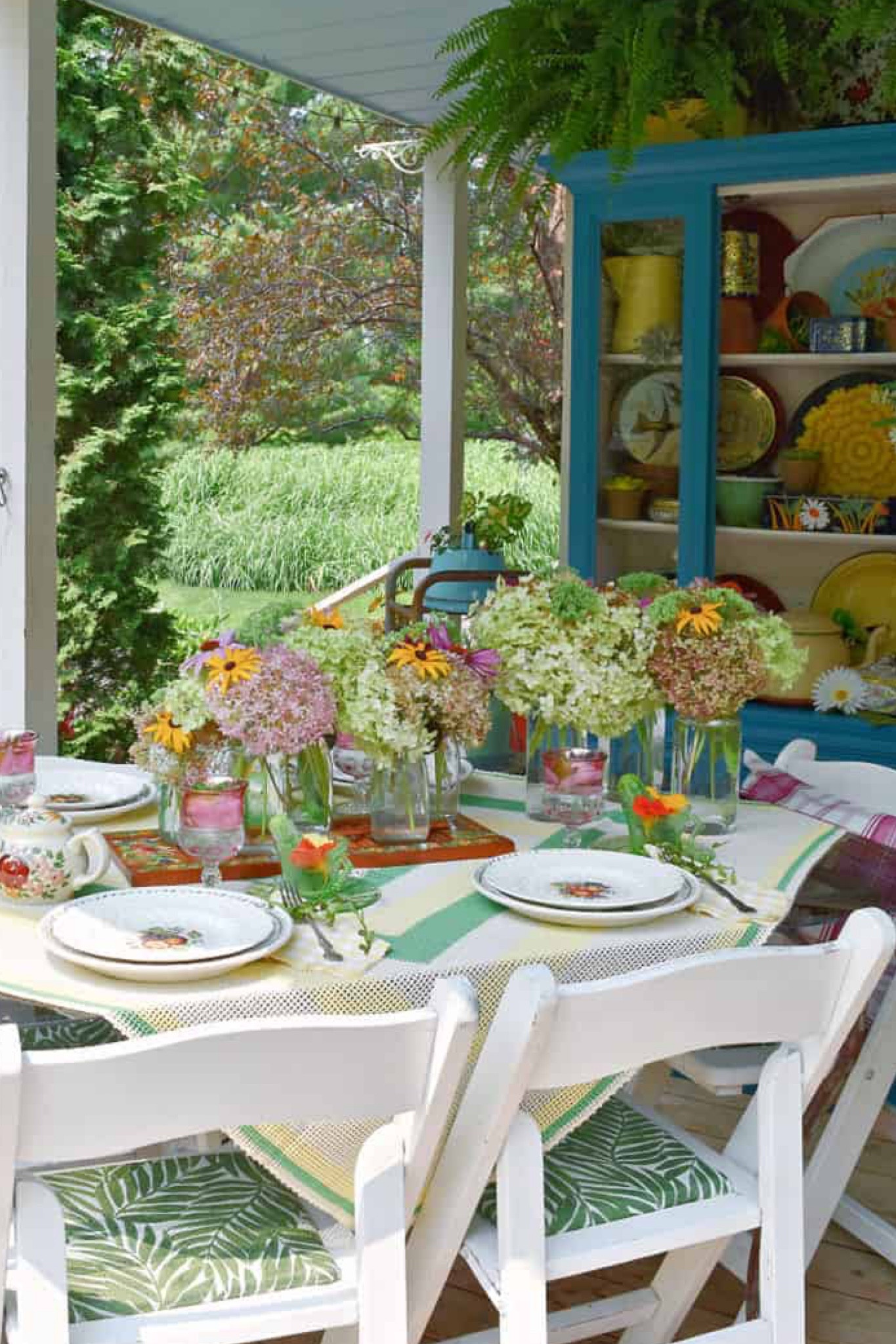 Late summer is the perfect time to enjoy eating outside. Set a pretty table to celebrate all the garden flowers with mix and match tableware. 
A cupboard on the porch is the perfect place to create a garden of floral accessories, too. Collect vintage Daher tins, perfect for a tea party theme. 
See the full table setting at Lorabloomquist.com

#LTKSeasonal #LTKParties #LTKHome