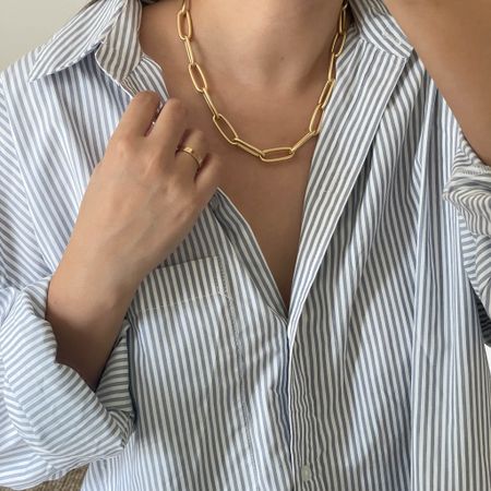 Oversized poplin shirt with a gold chunky necklace ✨ Both are on sale

Wearing a size L in shirt 

#LTKunder50 #LTKstyletip #LTKsalealert