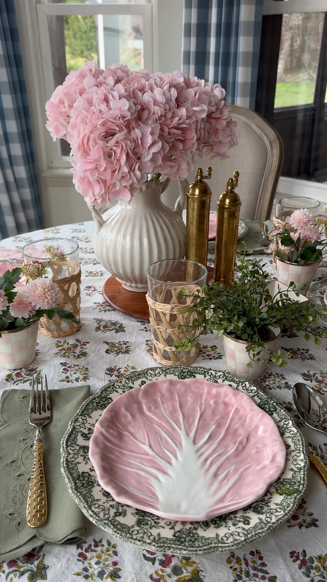 Spring Easter table setting inspo… floral spring tablecloth, scallop pink napkins, scallop green napkins, brass salt and pepper mill, pink cabbage plates, cream vase with handles, pink check herb pots, pink and green table setting 

#LTKSpringSale #LTKSeasonal #LTKHome