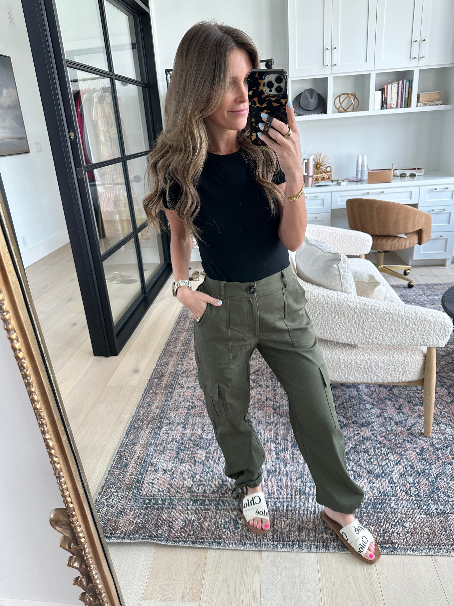 These cargo pants are so good! They fit tts. You can make them wide leg or tie them up to create a more tapered fit. They are mid rise with an elastic waistband for a cozy fit and are so flattering! This Amazon bodysuit has been a favorite of mine for a while, but I ordered it in the short sleeve! 

#LTKstyletip #LTKunder50