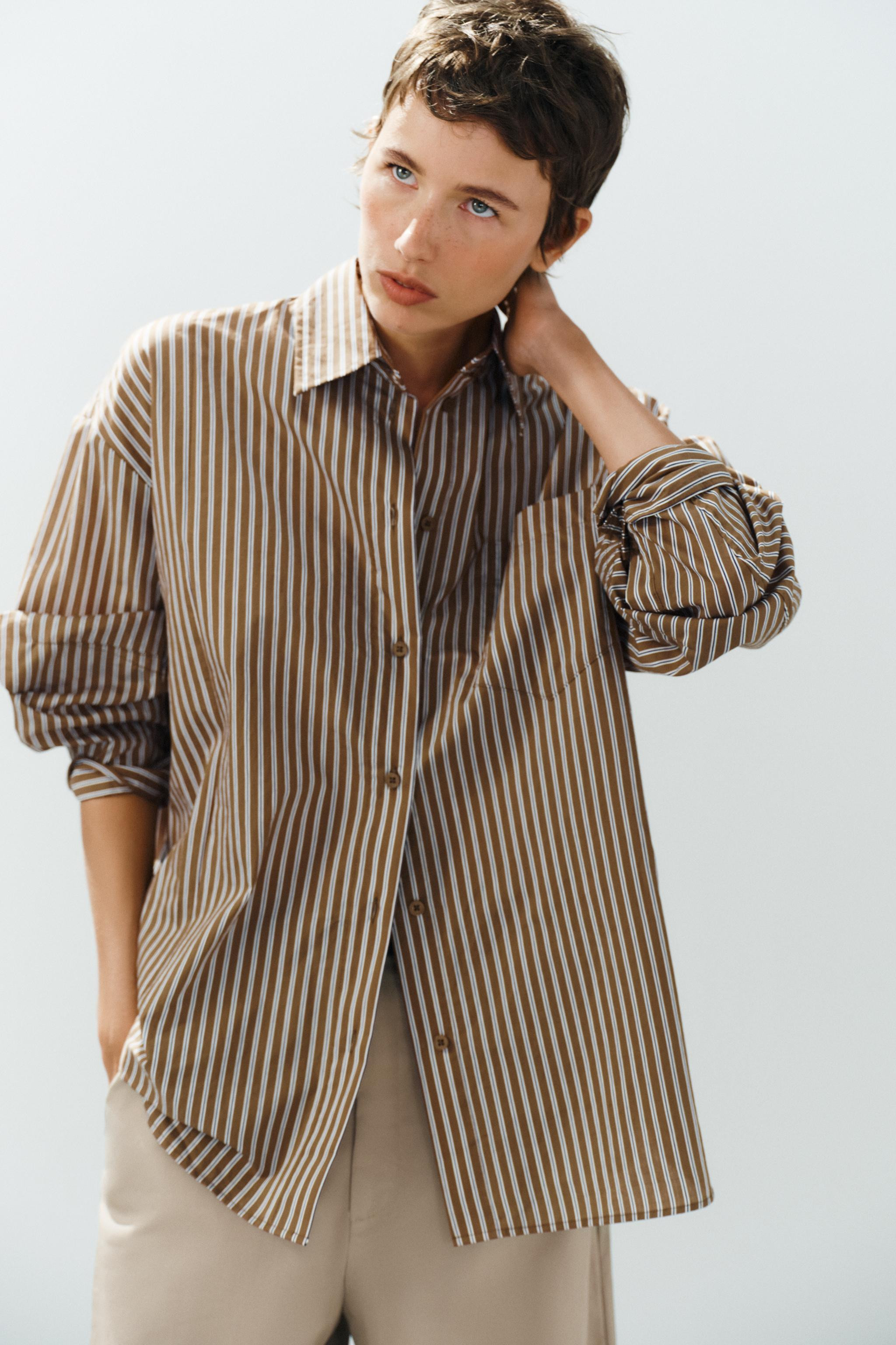 Long sleeve shirt with a lapel collar. Featuring a front patch pocket and button-up fastening. | Zara US
