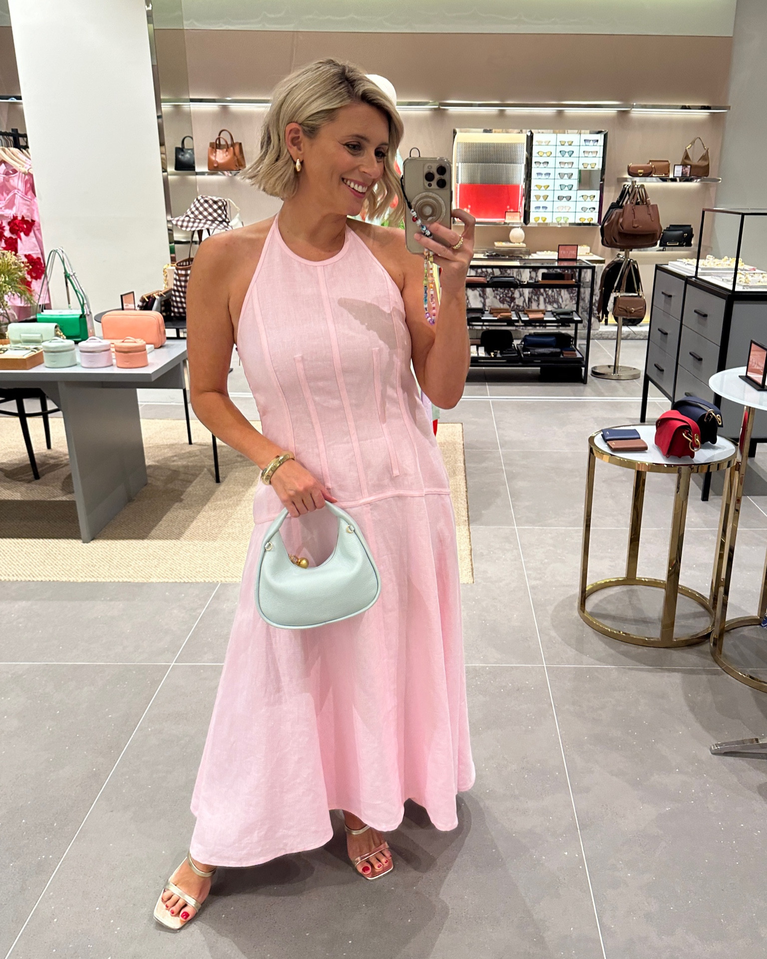 I’m lusting over this pastel pink maxi dress paired with a pastel clutch bag. 

#LTKover40 #LTKHoliday #LTKaustralia