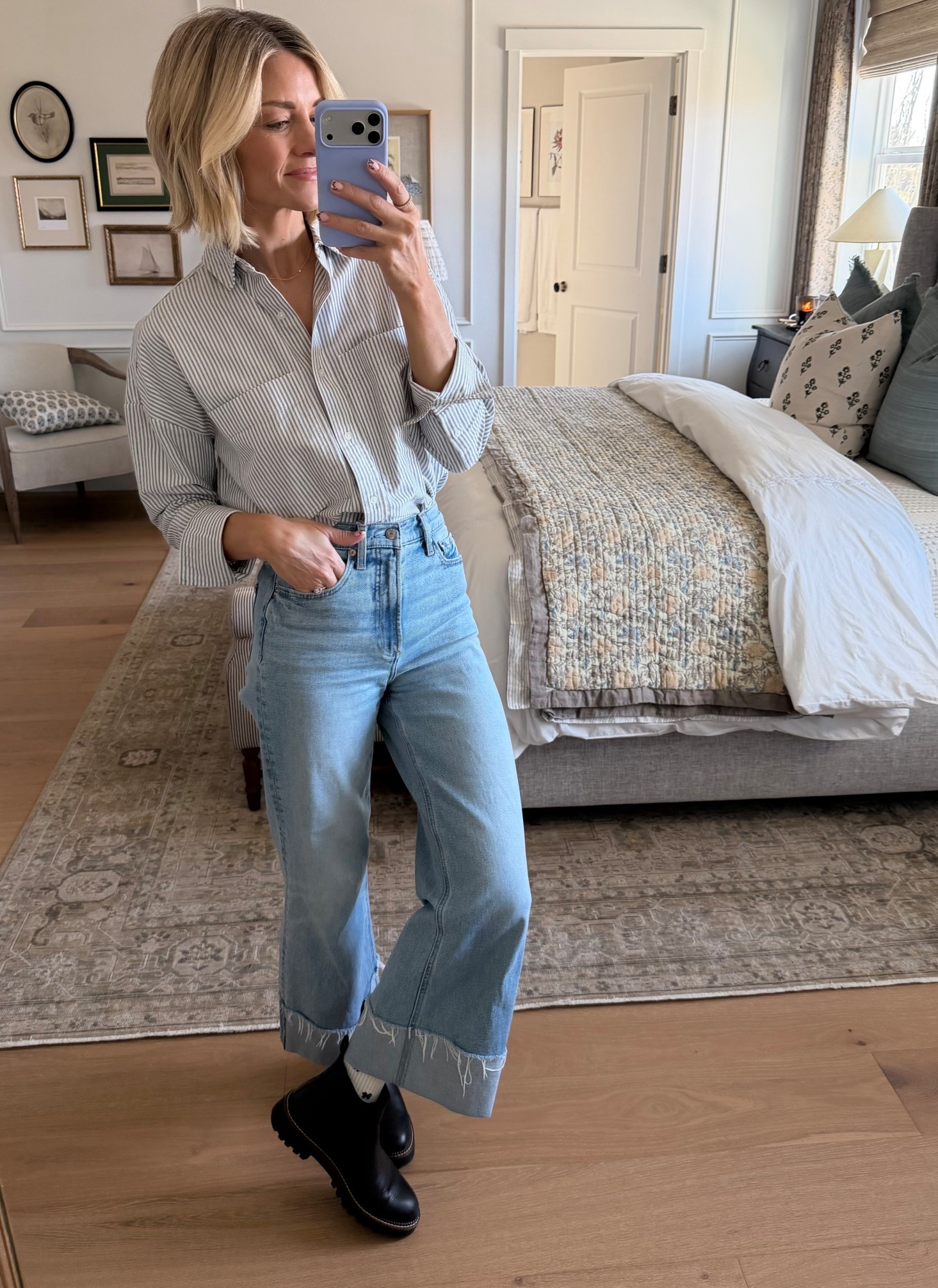 Love this crisp stripe button down. Wearing my normal size small in it. Wearing my normal size 25 in these cute cuffed denim.