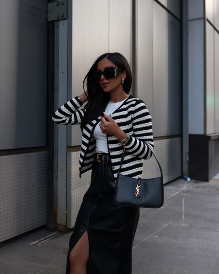 Spring workwear outfit ideas 
Nordstrom faux leather midi skirt with slit wearing a size 0
Mango striped cardigan wearing an XS
Saint Laurent bag and sunglasses 


#LTKSeasonal #LTKitbag #LTKworkwear