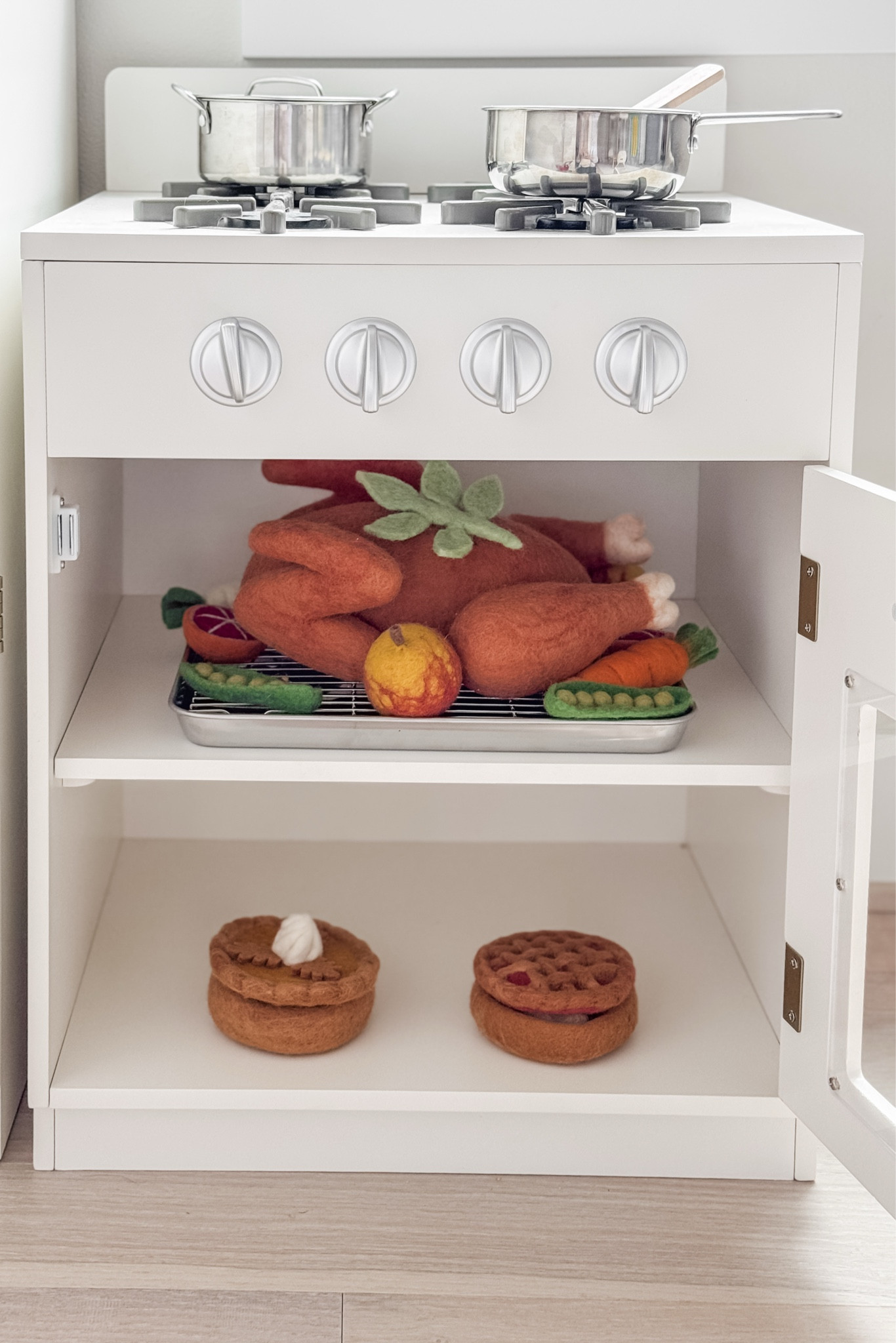 #LTKThanksgiving play is underway at our house! Our #LTKToddler is having so much fun “roasting” and “baking” these goodies for Thanksgiving dinner. I’m sure we’ll have some sensory bin play with them as well, but this dramatic play has been great for our Saturday morning. 

This roast turkey dinner is just the cutest and the turkey parts disassemble from the breast for “carving” (held together with Velcro strips). So clever and fun for littles! 🦃🥧 

#LTKSeasonal #LTKKids #LTKHoliday