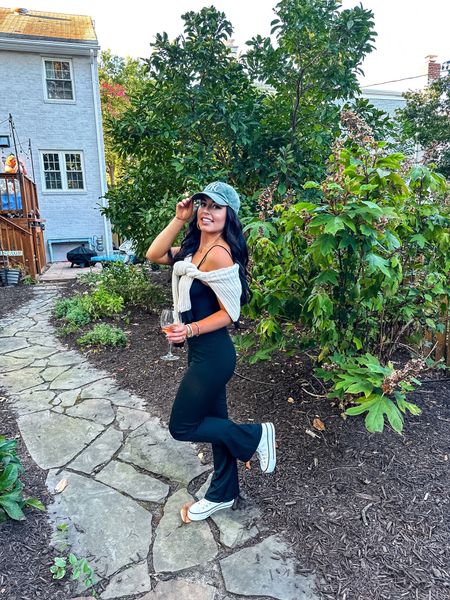 Under $40 amazon athletic jumpsuit (small, multiple colors, lulu inspired), NY hat, under $30 amazon converse lookalike sneakers and under $40 sweater (small)— a perfect early fall or fall transition activewear outfit! #founditonamazon 

#LTKfindsunder50 #LTKsalealert #LTKfitness