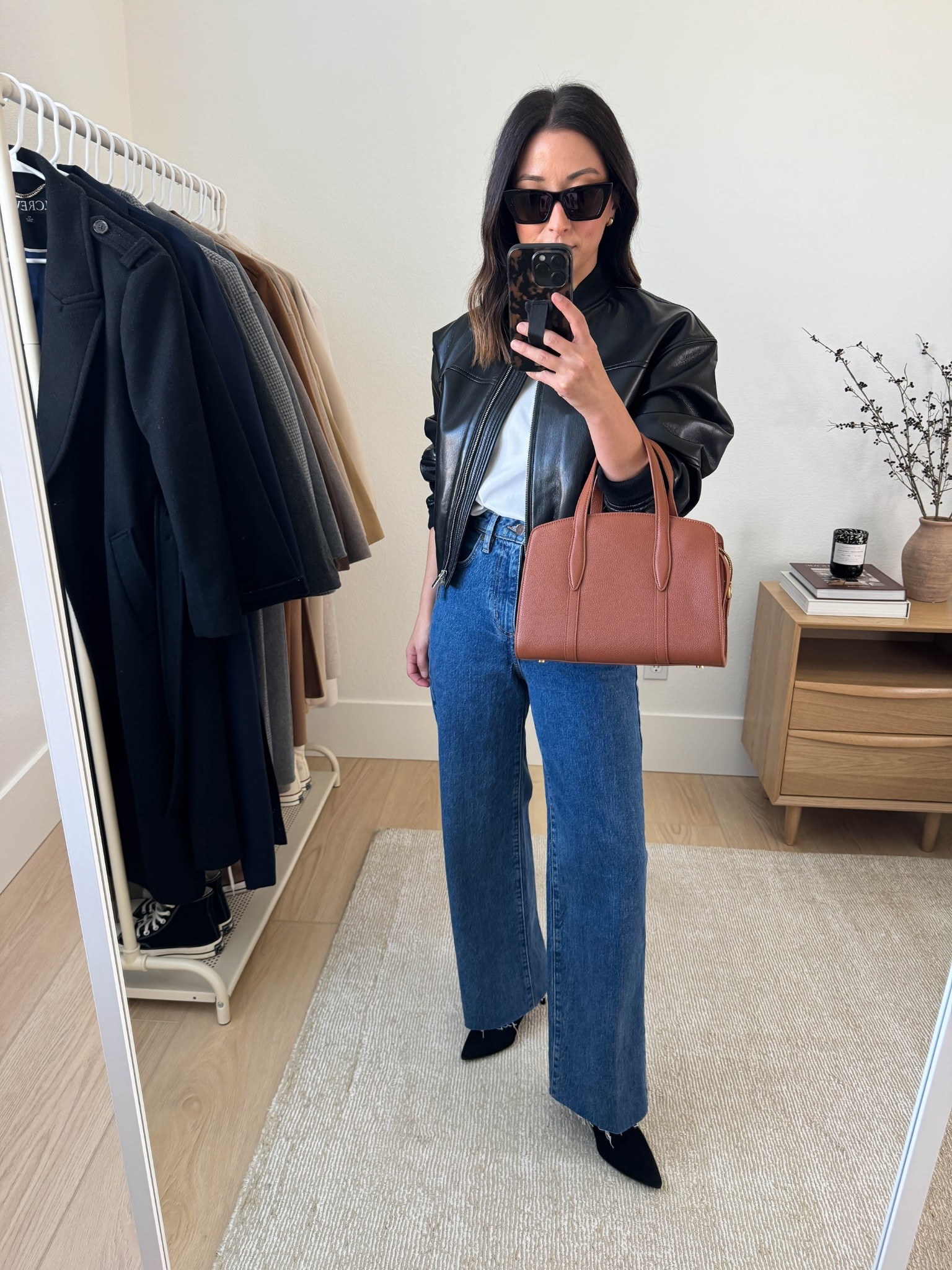 Fall outfits with heeled ankle booties. 

Aritzia synergy bomber jacket. Reviews say it runs small, but I disagree. Runs tts for me. Soft stunning faux leather  

Aritzia jacket xs
Aritzia tee medium
Aritzia jeans 26, sized up and cut hems.
Stuart Weitzman sock booties 35
Parisa Wang bag (can't be linked)
YSL Sunglasses
Dorsey James Necklace 15"

Fall outfits, fall style, petite style, jeans, boots 

#LTKStyleTip #LTKPetite #LTKSeasonal