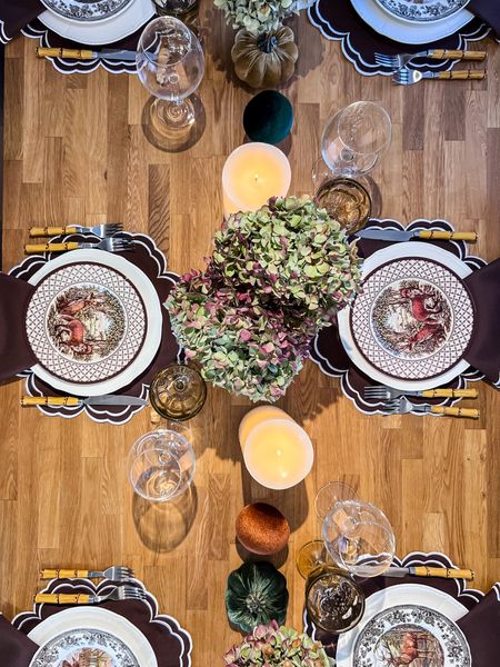 Earth tones for our Thanksgiving tablescape. Brown linens with fall themed salad dishes, velvet pumpkins and bamboo cutlery 


#LTKSeasonal #LTKstyletip #LTKHoliday
