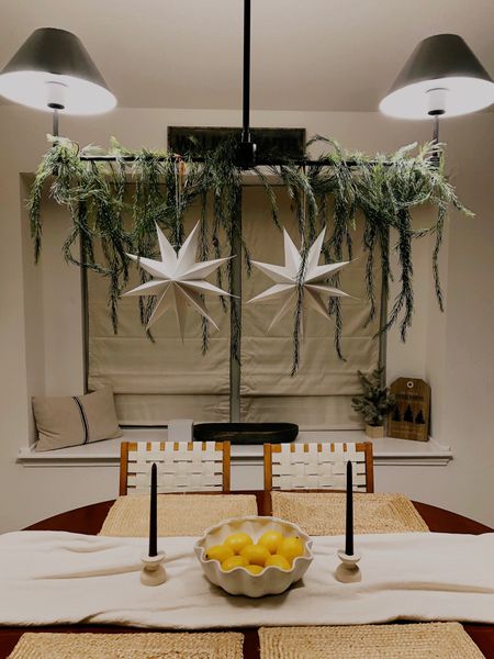 Totally stole the garland/stars idea from @studiomcgee ! 😍 (Found my exact garland on sale at JoAnn Fabrics today for $12!) #dining #holidaytable #christmasdecor #holidaydecor #interiordesign #homeinterior 

#LTKSeasonal #LTKHoliday #LTKhome