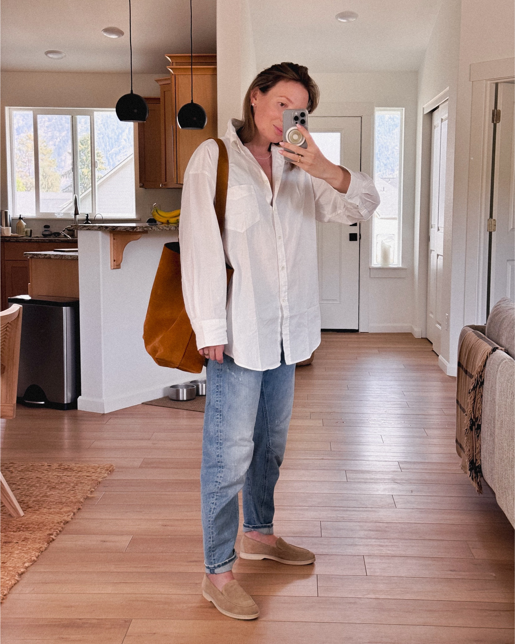 I completely forgot I had these jeans in size 28 (I think I might wanted to have an extra oversized fit at some point so I always wore them belted). Now at 20 weeks pregnant they fit just right! 
Wearing G Star Raw jeans (this specific wash is sold out but they have a darker wash available), similar style - Free People barrel leg jeans and Gap horseshoe jeans. 
Shirt: new find on sale from Gant, linked as is (review coming up later).
Shoes: Paul green loafers (sorry, sold out in this color but still available in blue), similar model by Vince. 
Bag: Madewell essential bucket tote. 
Necklace: Cat Bird NYC
Earrings: Ross Simons. 
Ring: Mejuri patra. 

#LTKFindsUnder100 #LTKSeasonal #LTKBump