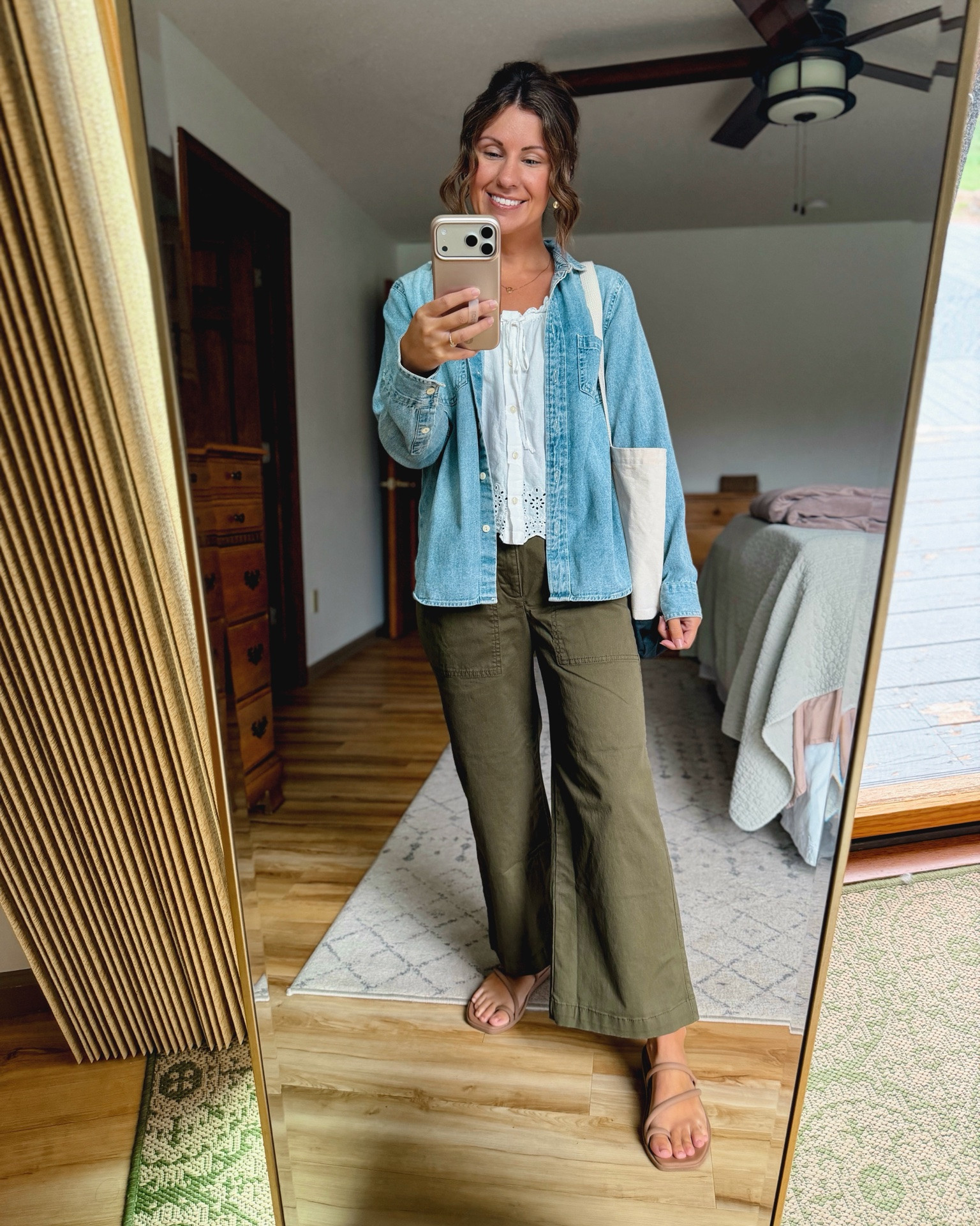 small in my denim shirt, xs in my little white top (sold out—linked similar). 24 short/petite in my pants and 6 in my croc sandals.