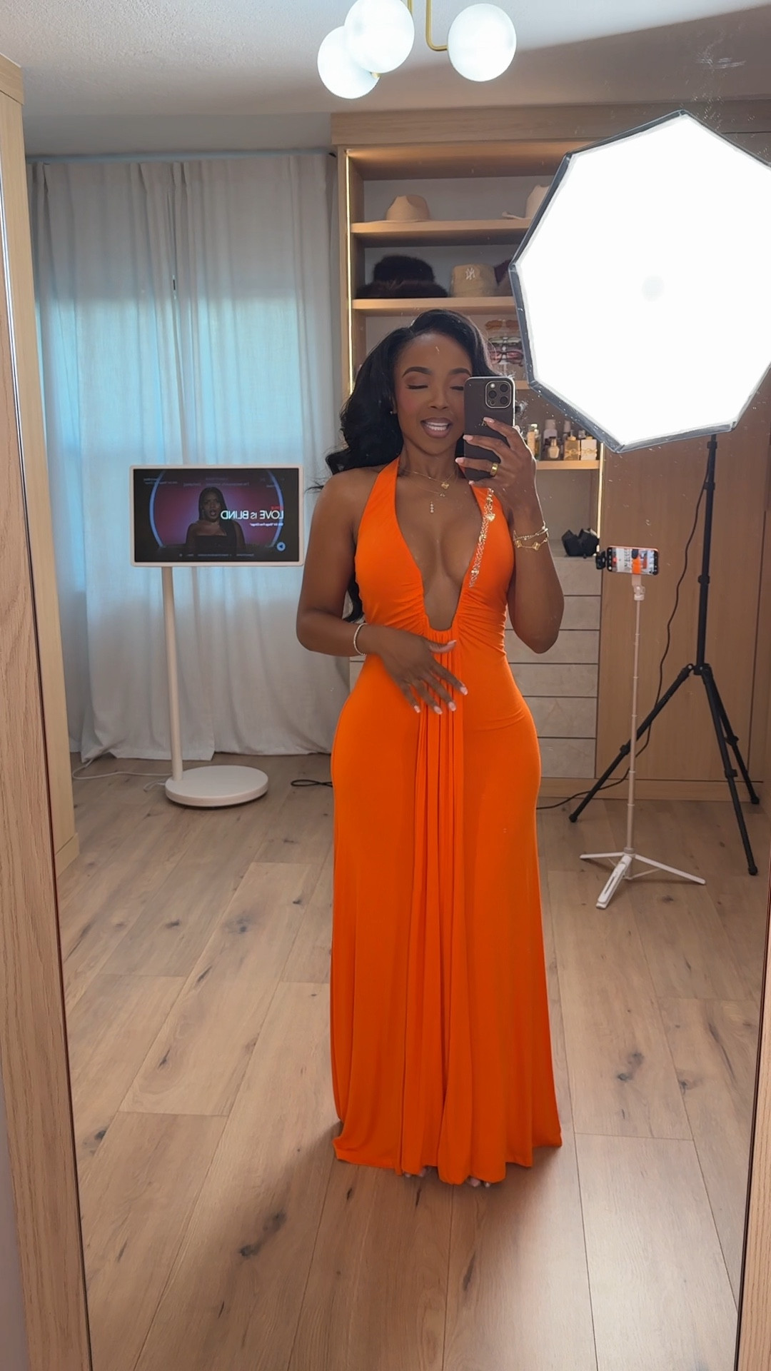 Bold, confident, and unforgettable 🧡 This vibrant orange halter maxi is a true statement moment. The plunging neckline and soft draping create the most flattering silhouette, while the flowing fabric gives beautiful movement with every step. It’s one of those dresses that instantly feels luxe — and because it works for multiple occasions, the cost per wear keeps dropping every time you restyle it.

Pair it with gold heels for a summer wedding guest look, strappy sandals for vacation dinners, or statement earrings for an elevated night out. The color alone does all the talking.

Perfect for: vacation evenings, summer weddings, birthday dinners, tropical getaways, formal events, or sunset photos.

Tap to get details and favorite to revisit for your next event.

📏 Sizing:
Wearing size Small  
Height 5’4” · 140 lbs · 36D · 27” waist · 40” hips

This post includes orange maxi dress outfit inspiration, halter neckline styling, summer wedding guest dress, tropical vacation outfits women, bold color evening looks, resort wear glam, statement maxi dresses, and capsule wardrobe event pieces styled multiple ways. @AKIRA 

Follow me on Instagram and YouTube @kirasfashionfinds