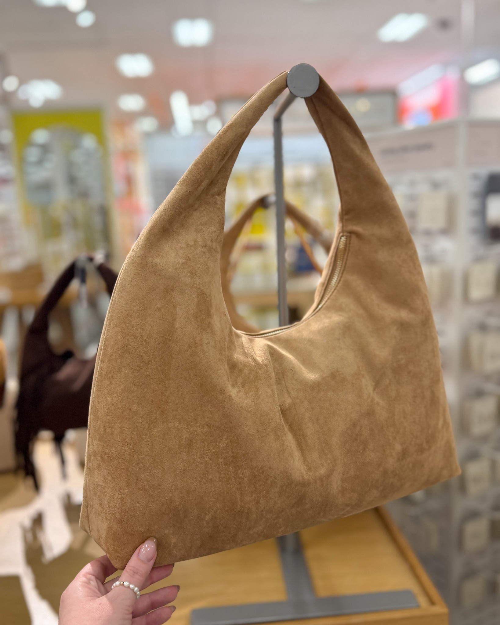 This bag looks so luxe for less! Comes in a really pretty chocolate brown too 🤎

Fall handbags, faux suede, trending, fall fashion, affordable finds, a new day, target, shoulder bag, fancythingsblog 

#LTKFindsUnder50 #LTKFindsUnder100 #LTKItBag