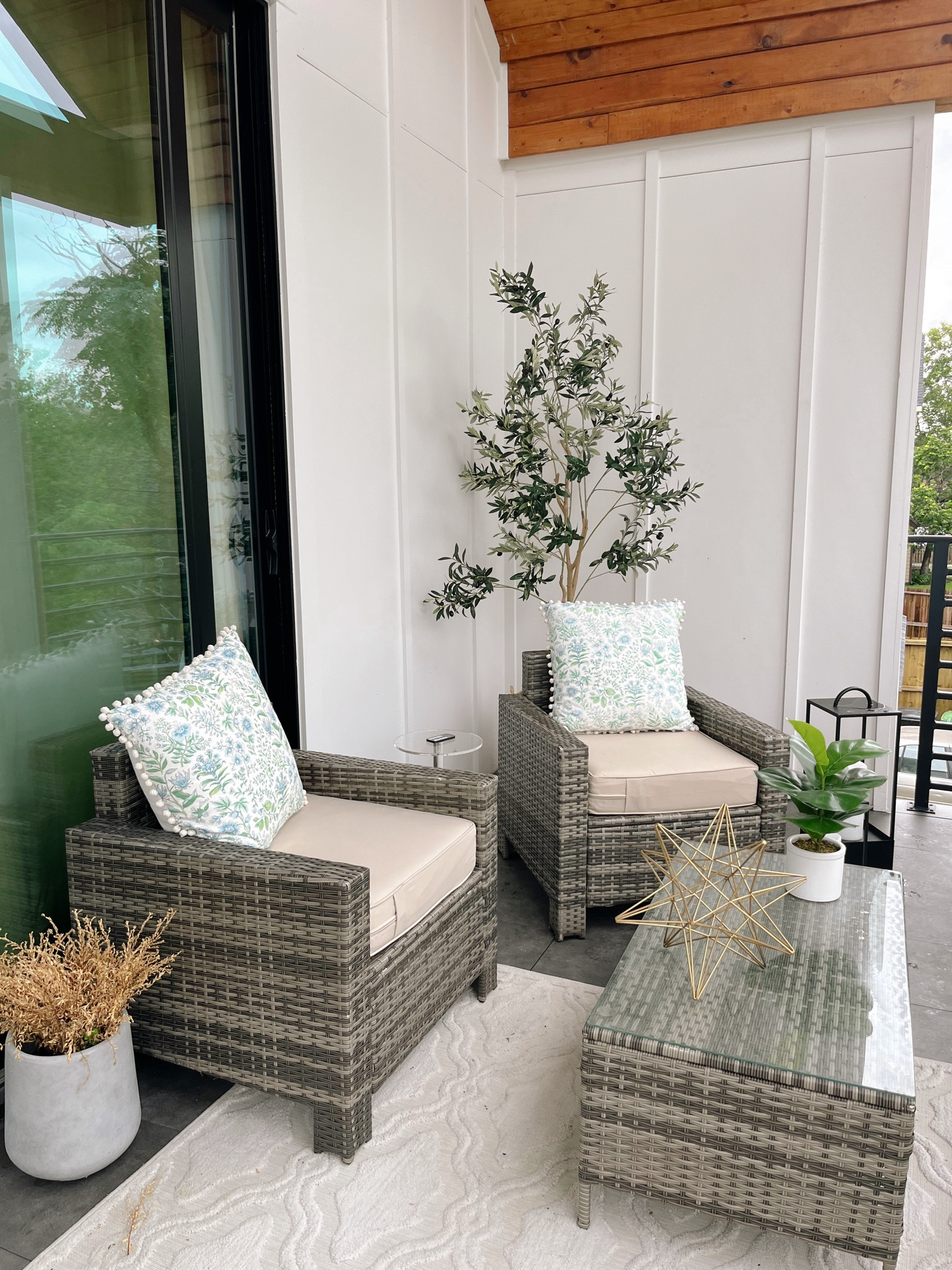Evies favorite spot. Little patio area 🤍 the pillows are out of stock but I tagged some other ones that look amazing and come in a variety of colors. 

Patio. Patio design. Patio decor. Faux olive tree. Amazon finds. Balcony ideas. Outdoor decor. Home decor. My Texas home. Outdoor lanterns. Outdoor rug. Walmart finds. Summer refresh. 

#LTKhome