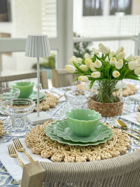 Spring tablescape finds on our screened in porch! 🌷 I couldn’t be more excited that spring is finally here! Meals outside are my favorite, so I gave our outdoor dining area a little spring refresh! These simple and chic swaps made such a big impact to the vibe in this space. From the gorgeous block print tablecloth, to the jade scalloped dishes, to the gold flatware and seagrass wrapped vase (that doubles as a candle hurricane) to the “pleated” cordless rechargeable lamps - they’re all on trend, affordable, and all from Walmart! They’re perfect for brunch, showers, Mother’s Day, graduation or any meal you want to make feel more special! Also linking our stackable rope dining chairs, white outdoor dining table and rope chandelier.
.
#ltkhome #ltkfindsunder50 #ltkfindsunder100 #ltkseasonal #ltkparties #ltksalealert spring table decor, entertaining ideas, party decor#LTKsalealert #LTKhome

#LTKHome #LTKSeasonal #LTKSaleAlert