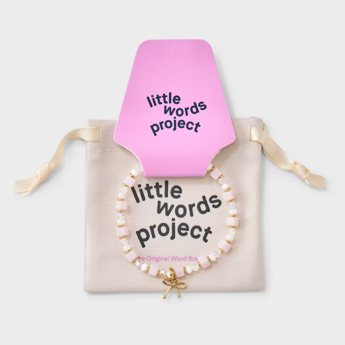 Little Words Project Bow Charm Beaded Bracelet - Pink/Clear/Gold | Target