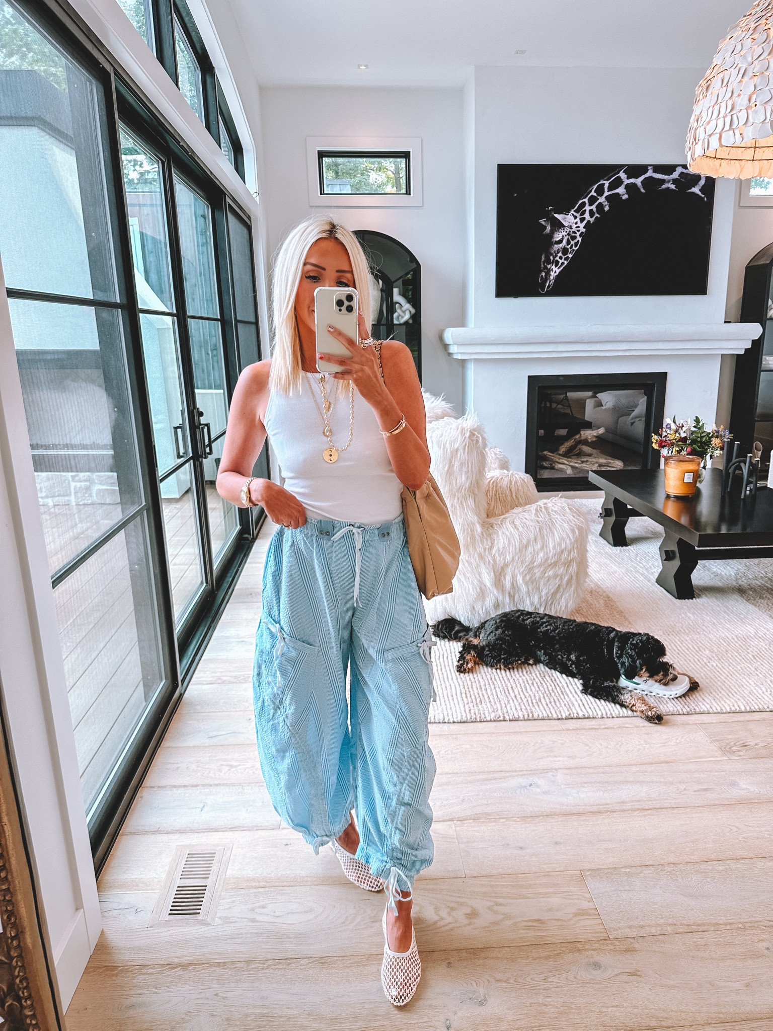 Wearing a small in tank and pants 