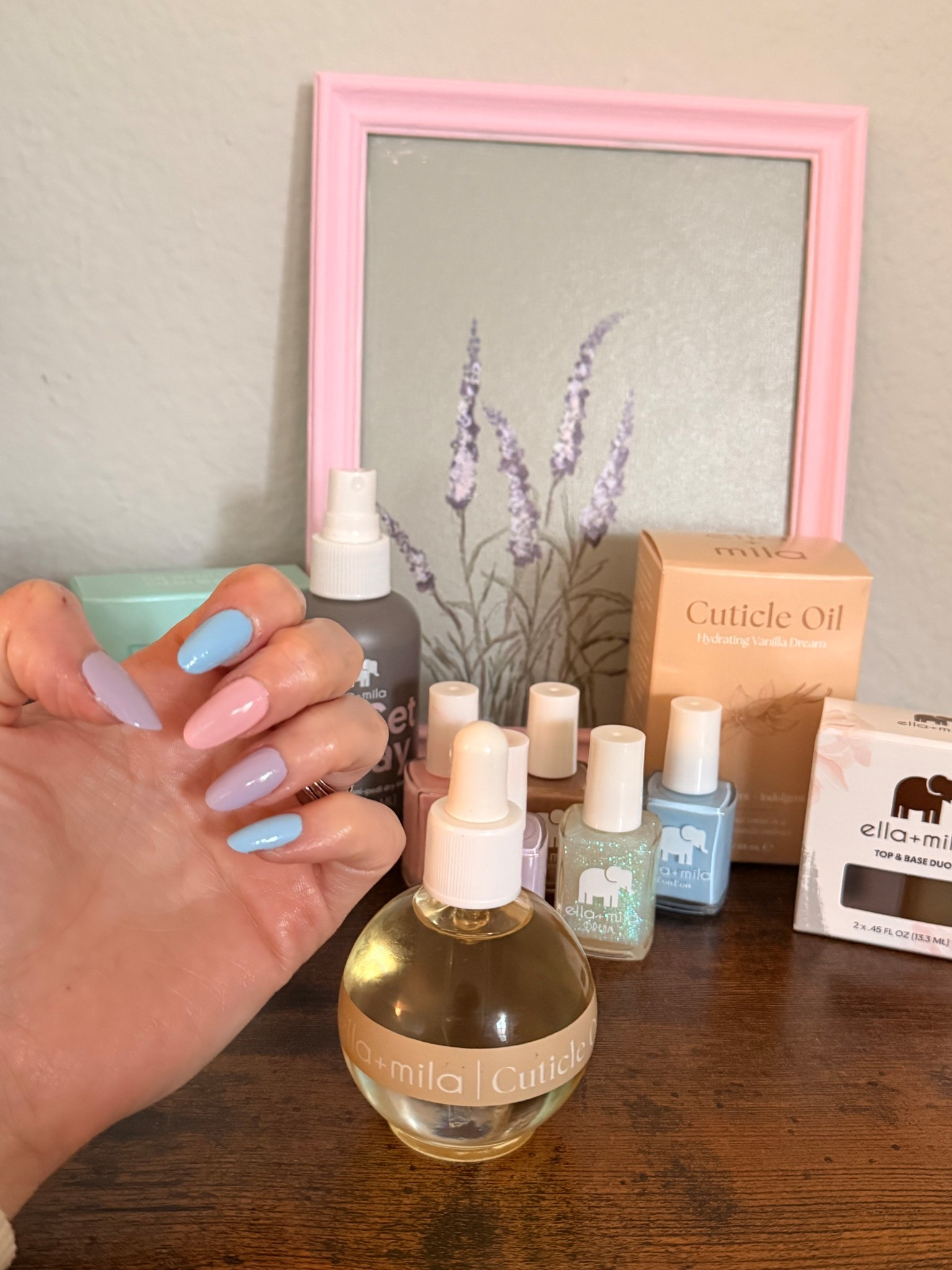 #ad PASTEL SPRING! Dreaming of all the flowers and spring colors ☺️ I found the most vibrant high quality nail polishes by #ellamila upgrade your manicure with the hydrating new cuticle oils! I personally love the Hydrating vanilla dream 😍 cozy smell without being overpowering. You’d never be able to tell that my hands were so wintery dry before applying it. @ellamila 

P.S the brand is vegan 🐣☺️💕 

Cuticle oil-Hydrating vanilla dream 
Colors!
My rain-beau (blue shade)
Lavender Drop (purple shade) 
Pink drink (pink shade)
Spin me round (glittery shade)
In a rush (top coat)
All about that base (base coat) 

Jet set spray (fast drying mist) amazing!!! 

Soy polish wipes (nail polish wipes on the go) 

#ellamila #ellamilapartner 

