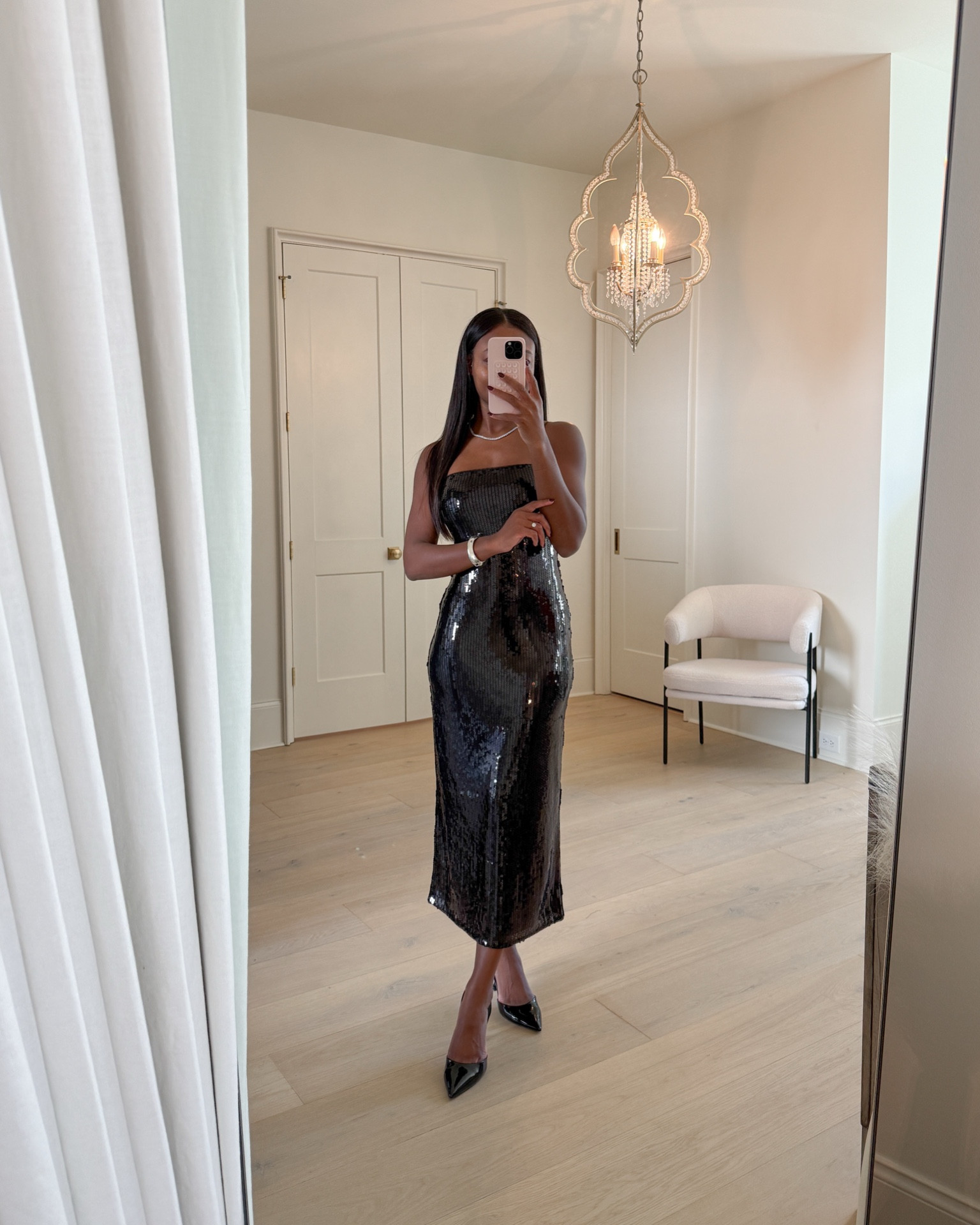 Black sequin midi dress! The perfect holiday party dress. Wearing an XS for reference! 

#LTKWedding #LTKHoliday #LTKCyberWeek