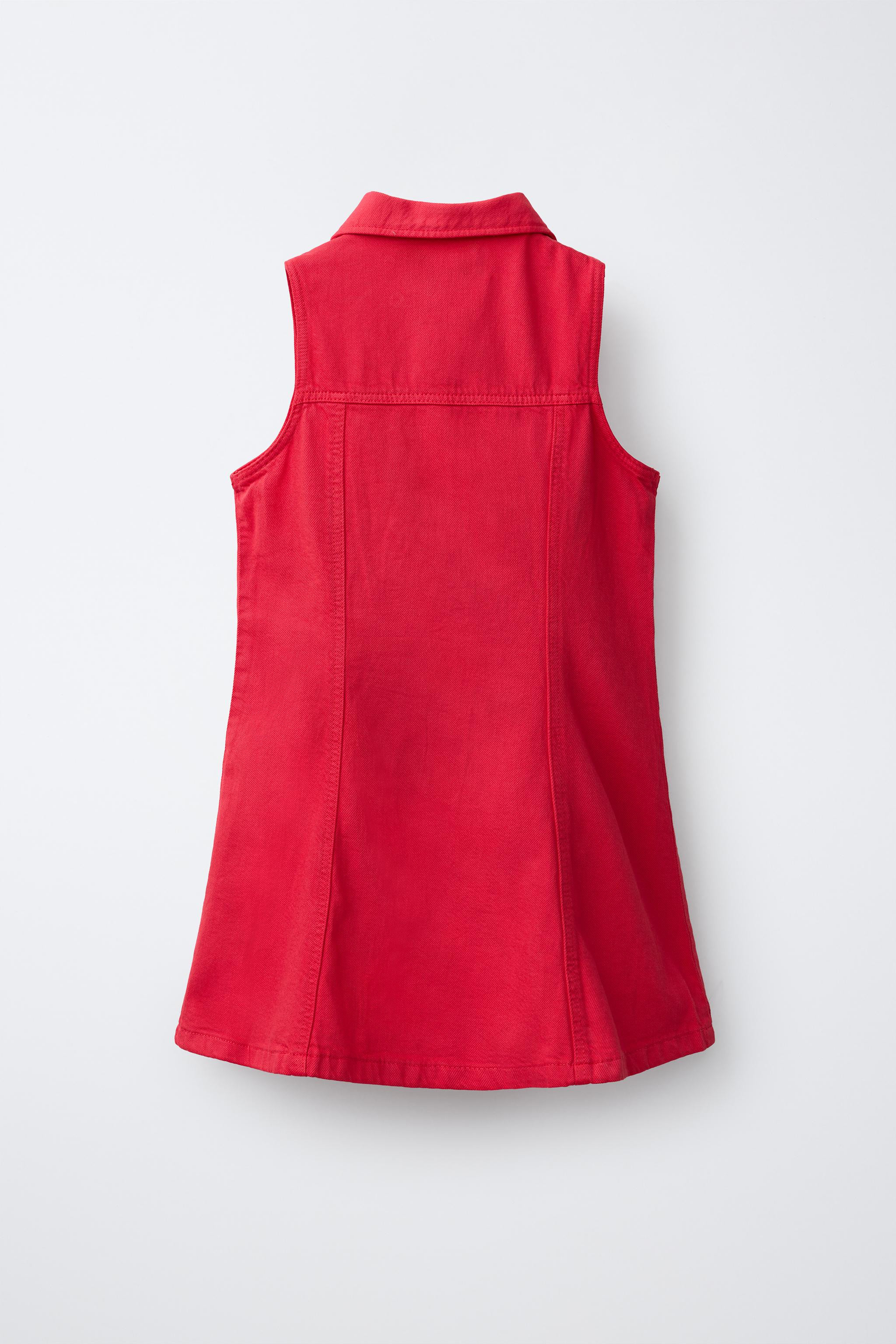 Denim dress with a shirt collar and sleeveless design. Front snap-button closure. Chest flap patc... | Zara US