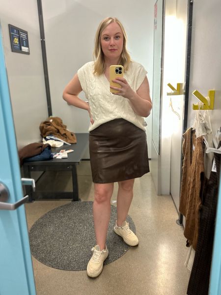 Sweater vests are going to be a major style trend. Sized down to a small. The leather skirt I sized up to a large. #hocspring for the vest #hocautumn for the skirt 