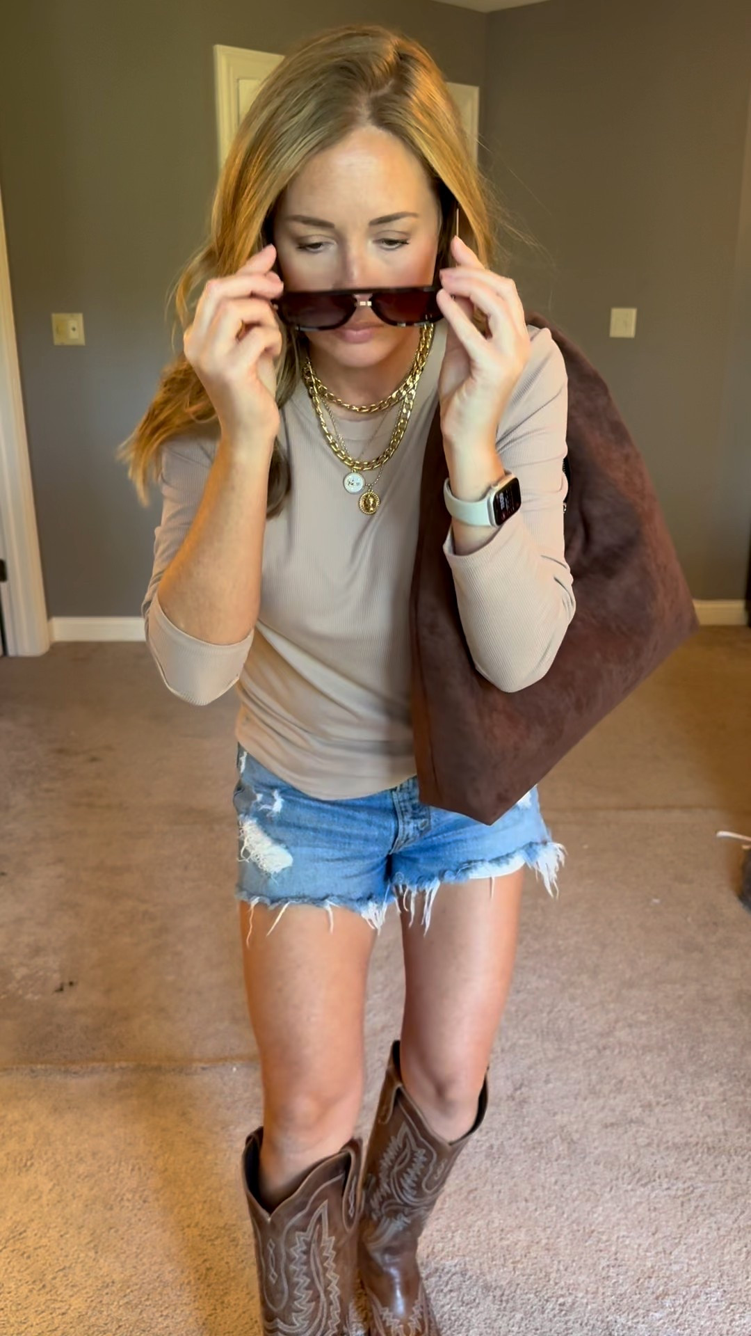 Cowboy Boots, Denim shorts, long sleeve ribbed crew neck shirt, aviator sunglasses, suede brown shoulder bag, purse, Fall outfit, casual outfit, country concert, western #Falloutfit #cowboyboots #boots #suede #chocolatebrown



#LTKSaleAlert #LTKOver40 #LTKStyleTip