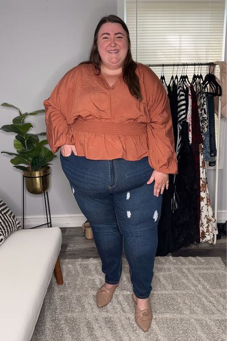 This was my first time in a long time trying out Eloquii’s denim, and I was so impressed! I remember from an older pair of jeans I had from them that I like to size up one in their pants, so I got these skinny jeans in a size 30 and they fit great! I have worn them out for a full day, and there wasn’t any super intense stretching out or bagginess that happened through the day. They are on sale right now for $39 (were $90). I paired them with this super cute copper smocked waist peplum top that is SO perfect for Georgia fall. It’s so lightweight but still gives that illusion of a true fall top. I love it so much! I got it in a size 28 - could have done with a 26, but don’t mind the extra room! It’s on sale right now for $29 (was $70)! Shoes are old from Target, so I linked some similar options

#LTKplussize #LTKsalealert #LTKSeasonal
