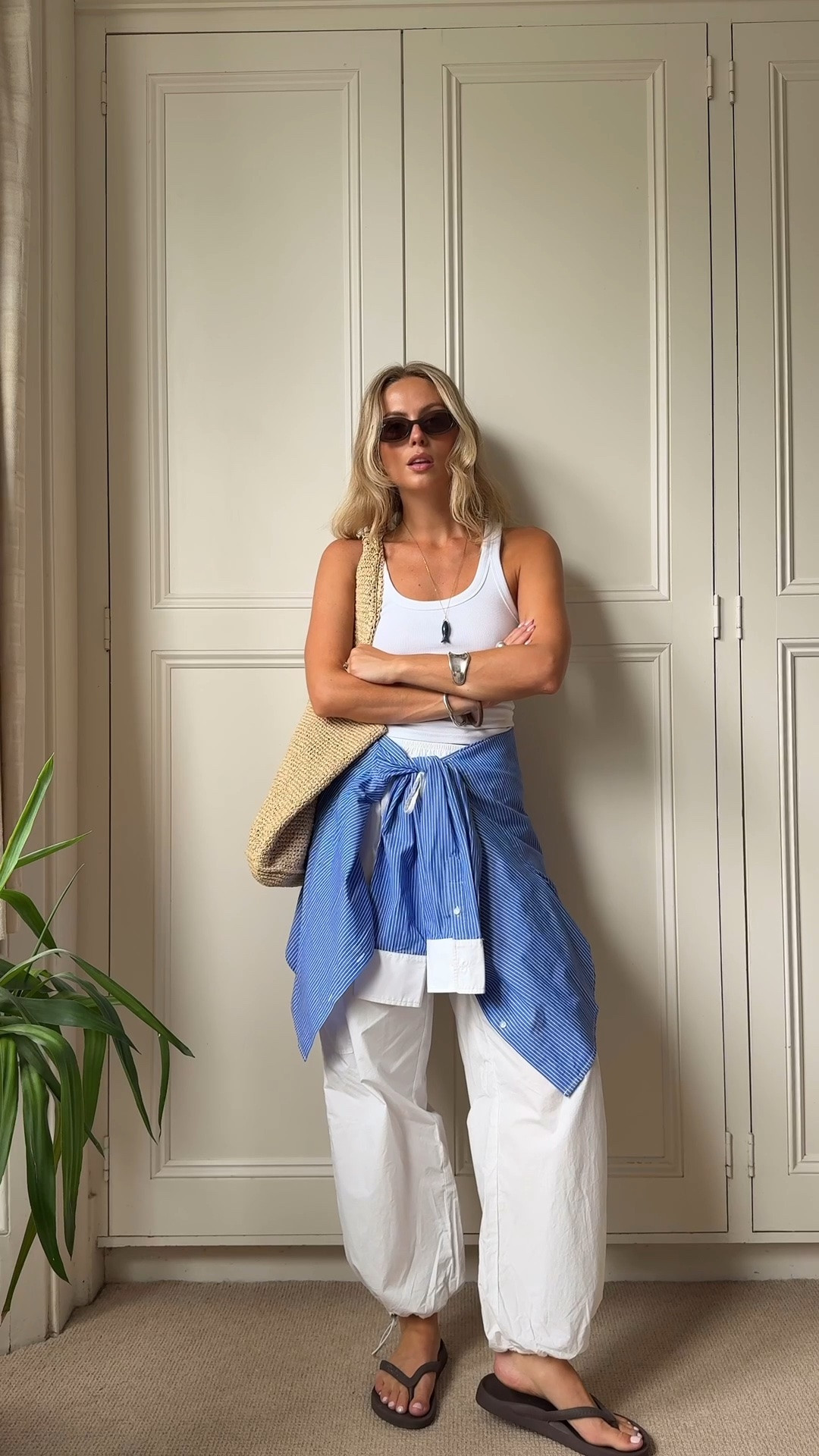 Simple summer outfit x

Parachute trousers, white trousers, balloon trousers, cargo trousers, Ro&Zo, blue striped shirt, white tank, white vest, raffia bag, brown flip flops, fish necklace, simple styling, summer outfit, hot weather outfit

#LTKuk #LTKsummer #LTKeurope