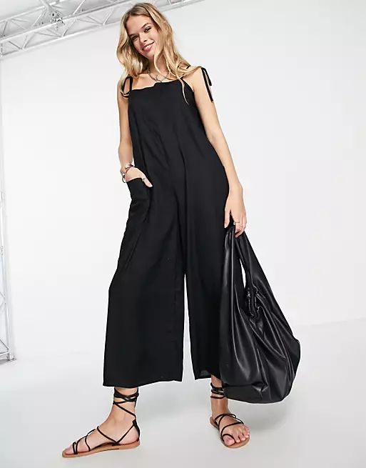 ASOS DESIGN cami minimal pocket jumpsuit in black | ASOS (Global)