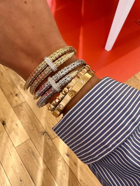 John Hardy’s newest collection - I’m in love with these woven chain adjustable slip on bangle bracelets with diamonds. They’re so easy to get on and off, they expand and tighten as needed. Available in gold and sterling silver. 

Gold bracelets
Bracelet stack
Diamond bracelet
Silver jewelry
Spear

#LTKStyleTip #LTKOver40