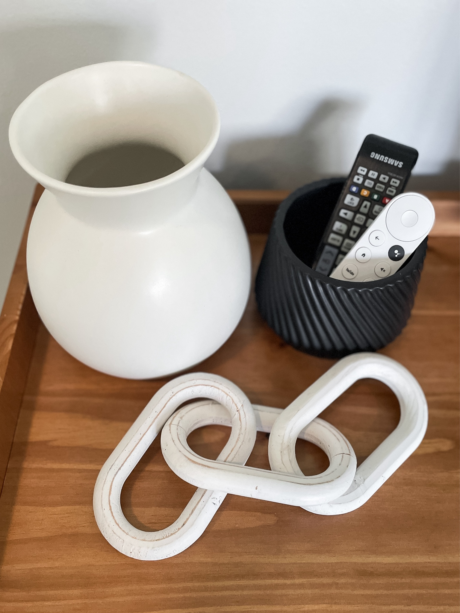 I found these Walmart accessories for a client bedroom.  

Walmart vase.  Walmart black planter.  White links.  

#LTKstyletip #LTKfindsunder50 #LTKhome