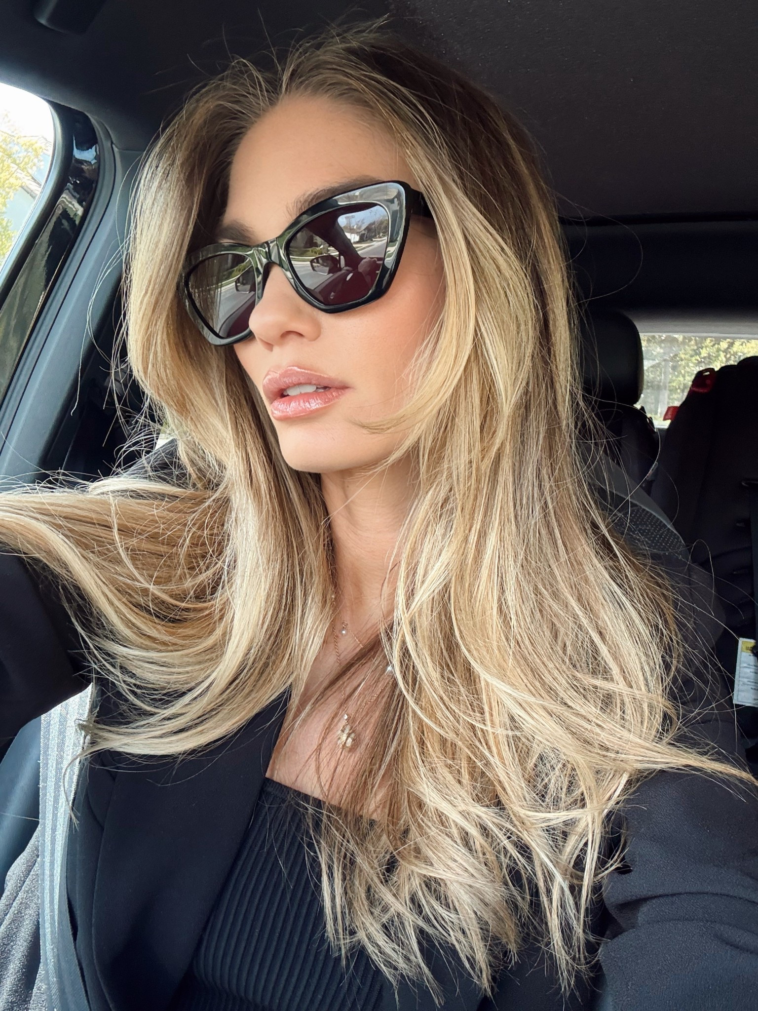 These are the best sunglasses I’ve had in years! They are high quality and have an expensive, sleek, solid feel in the hands but are lightweight on the face. The subtle cat eye makes them a chic option for easily elevating any look