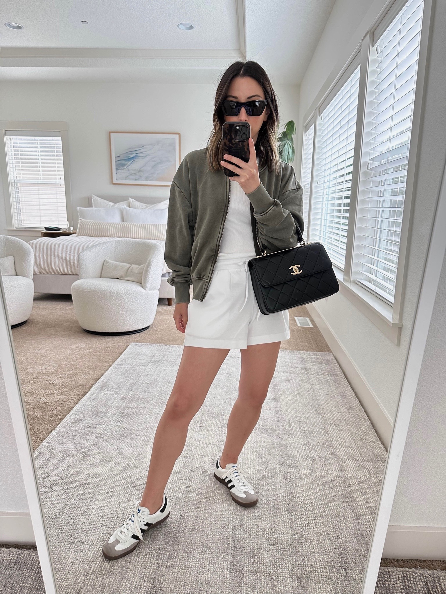 Gap spring/summer try-on. Comfy bomber jacket. Love this layer, so comfy! On sale! 

Gap bomber jacket petite small. I sized up. 
Haven Well within Tank xs
haven Well Within Shorts xs
Adidas samba sneakers 4.5 men’s. 
Chanel trendy cc small

Bomber jacket, sneakers, petite style, summer outfit. 

#LTKshoecrush #LTKunder100 #LTKsalealert