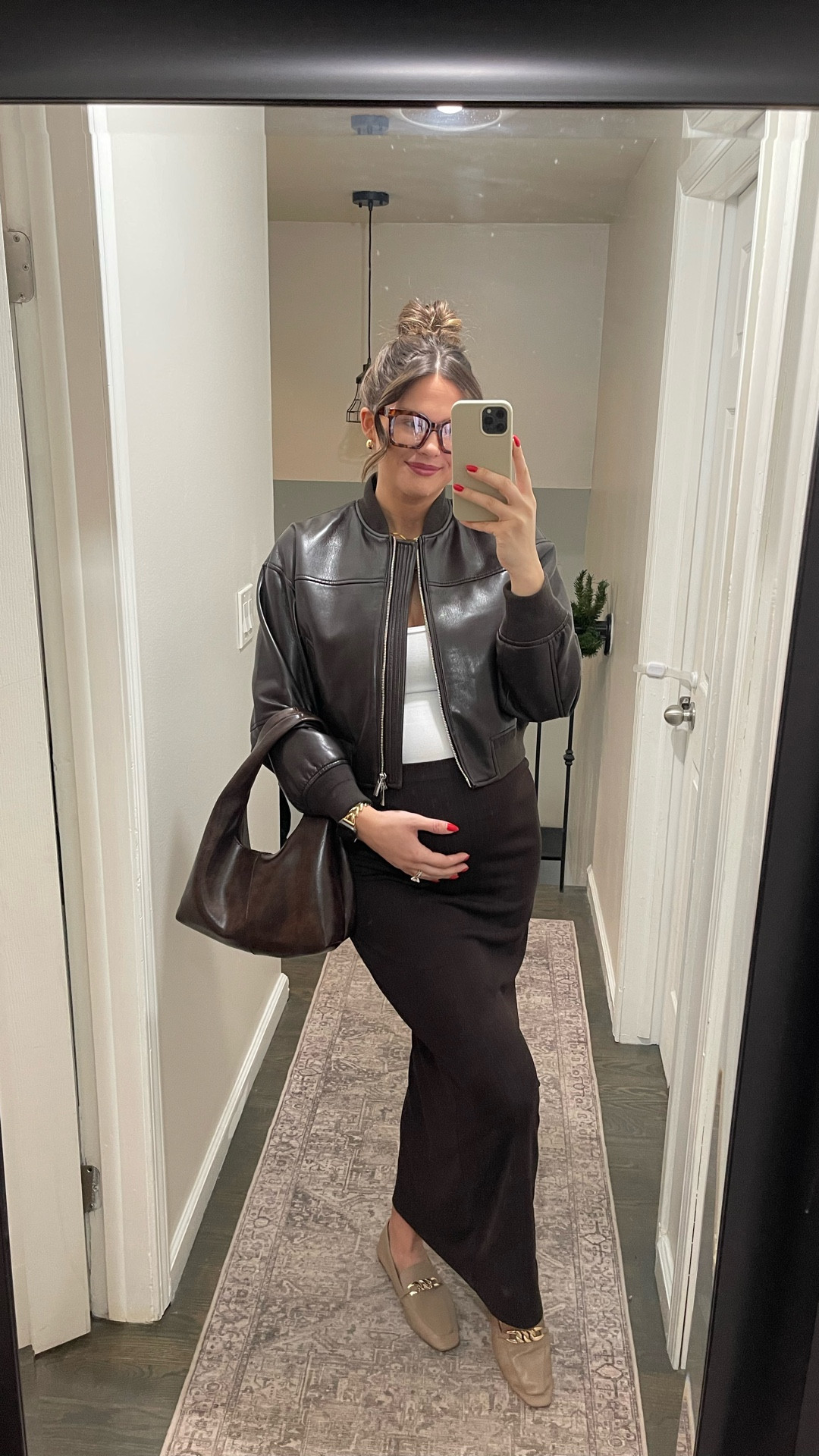 Ramping up the holiday outfits with only 9 days left until Christmas 🤯

Seriously someone please tell me where the time went!! 

Jacket: @aritzia 
Top: @aritzia 
Skirt: @amazon 
Shoes: @hm

#LTKTall #LTKBump #LTKHoliday