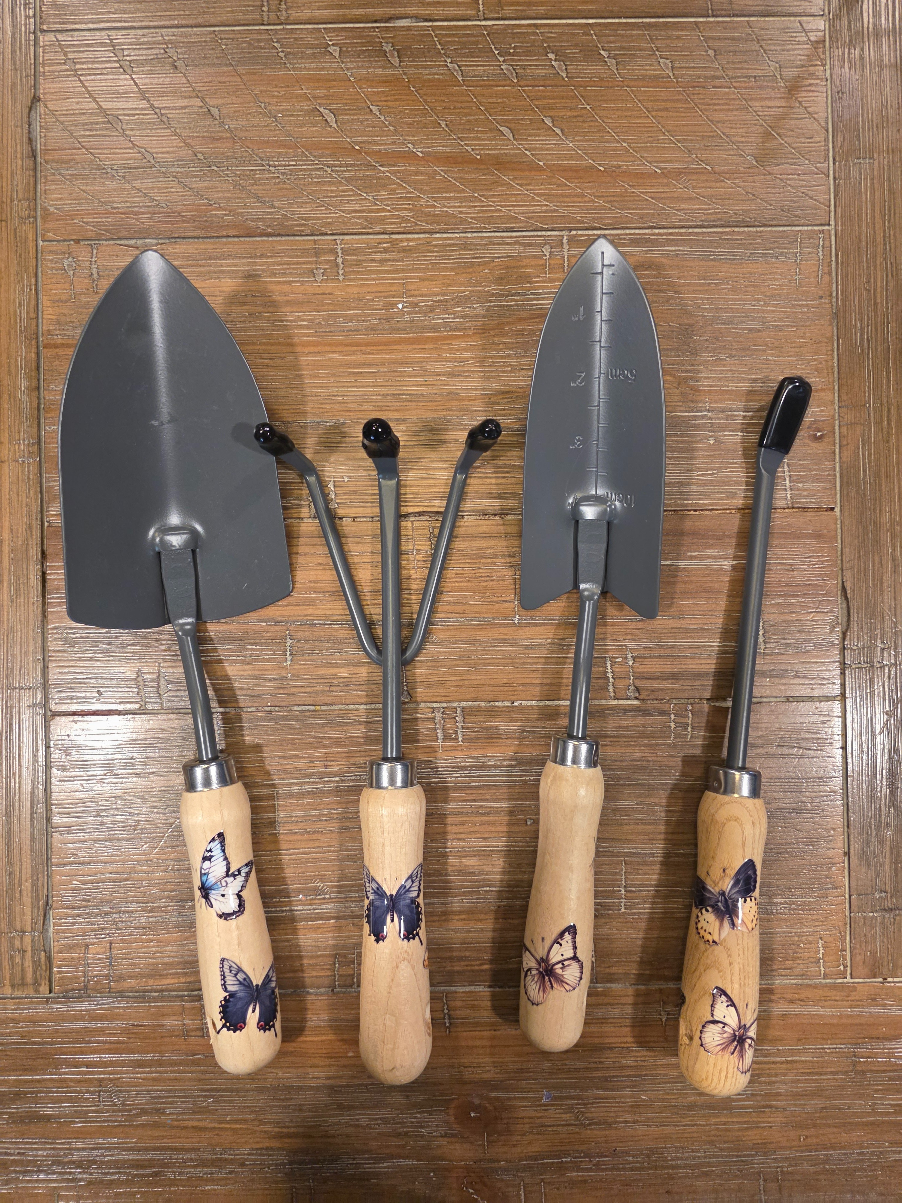 Sometimes you just do something purely because it's pretty. Butterfly rub on transfers on wooden garden tool handles. It took ten minutes and made my whole afternoon. Linking everything below! #garden  

 #LTKHome