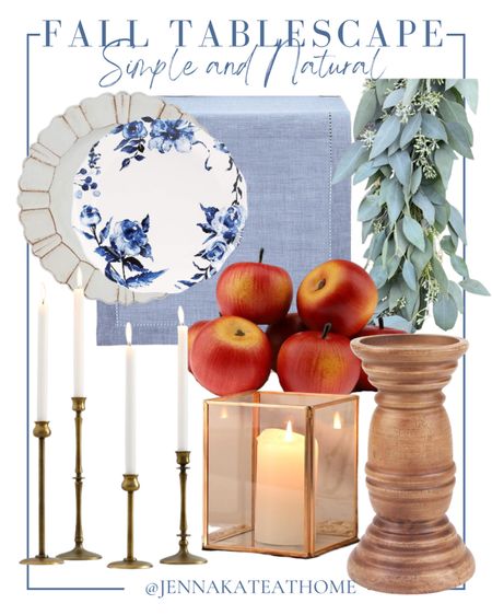 Create a simple and natural fall tablescape with light blue table runner, blue and white decorative plates, cream colored charger plates, brass candlesticks, wooden candleholders, lanterns, faux apples and eucalyptus garland. Home decor.

#LTKhome #LTKSeasonal