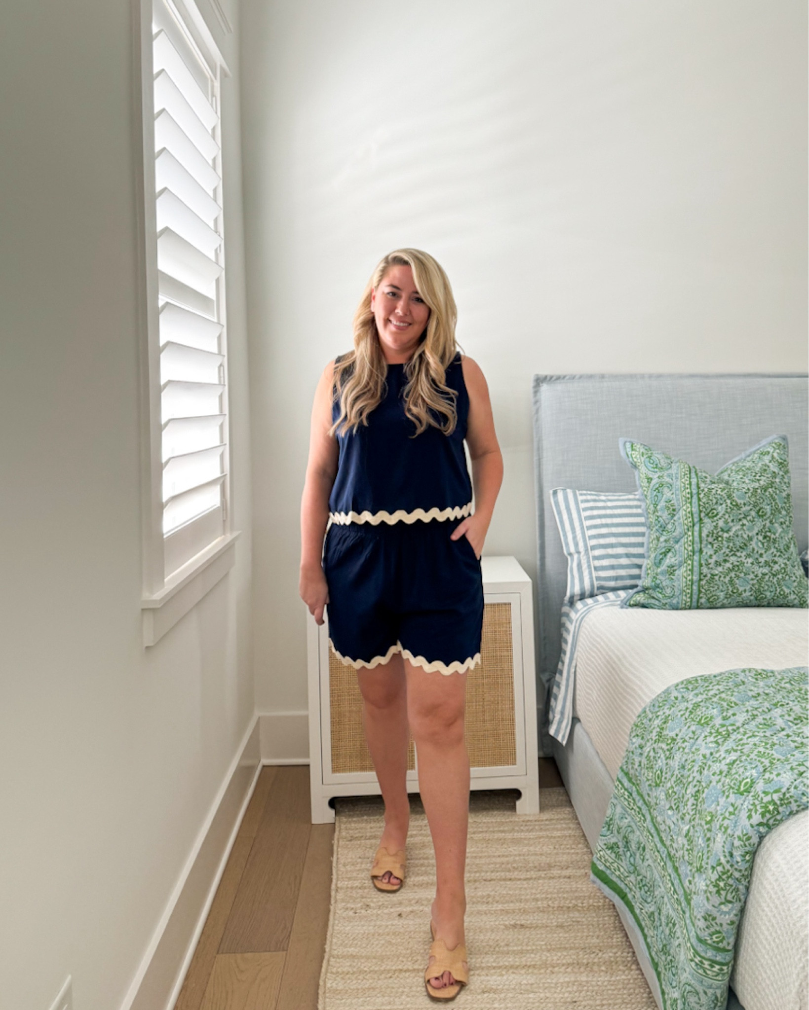 Loving this Amazon ricrac two piece set so much! I’m 5’9”, size 12 and wearing the XL. The fabric doesn’t stretch like the coordinating dress does, but the waist is elastic and pull on. Although the top is cropped, the shorts are high-waisted so you don’t have to show skin if you don’t want to! Comes in a bunch of cute colors and perfect for a beach vacation! So comfy and flattering! Also linking my two other wins from the order as well as my $20 raffia sandals and bedroom decor.
.
#ltkover40 #ltkmidsize #ltkfindsunder50 #ltkfindsunder100 #ltkwedding #ltkworkwear #ltkseasonal #ltktravel Amazon finds, lounge set, tank and shorts set, affordable beach clothes, ric rac outfit. 

#LTKfindsunder50 #LTKmidsize #LTKover40