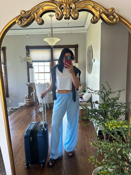 Yesterday’s travel outfit 
Stripe pants I sized up to a M!
Sandals are the sandals for spring!! Wearing an 8! TTS

#LTKstyletip #LTKtravel #LTKsalealert
