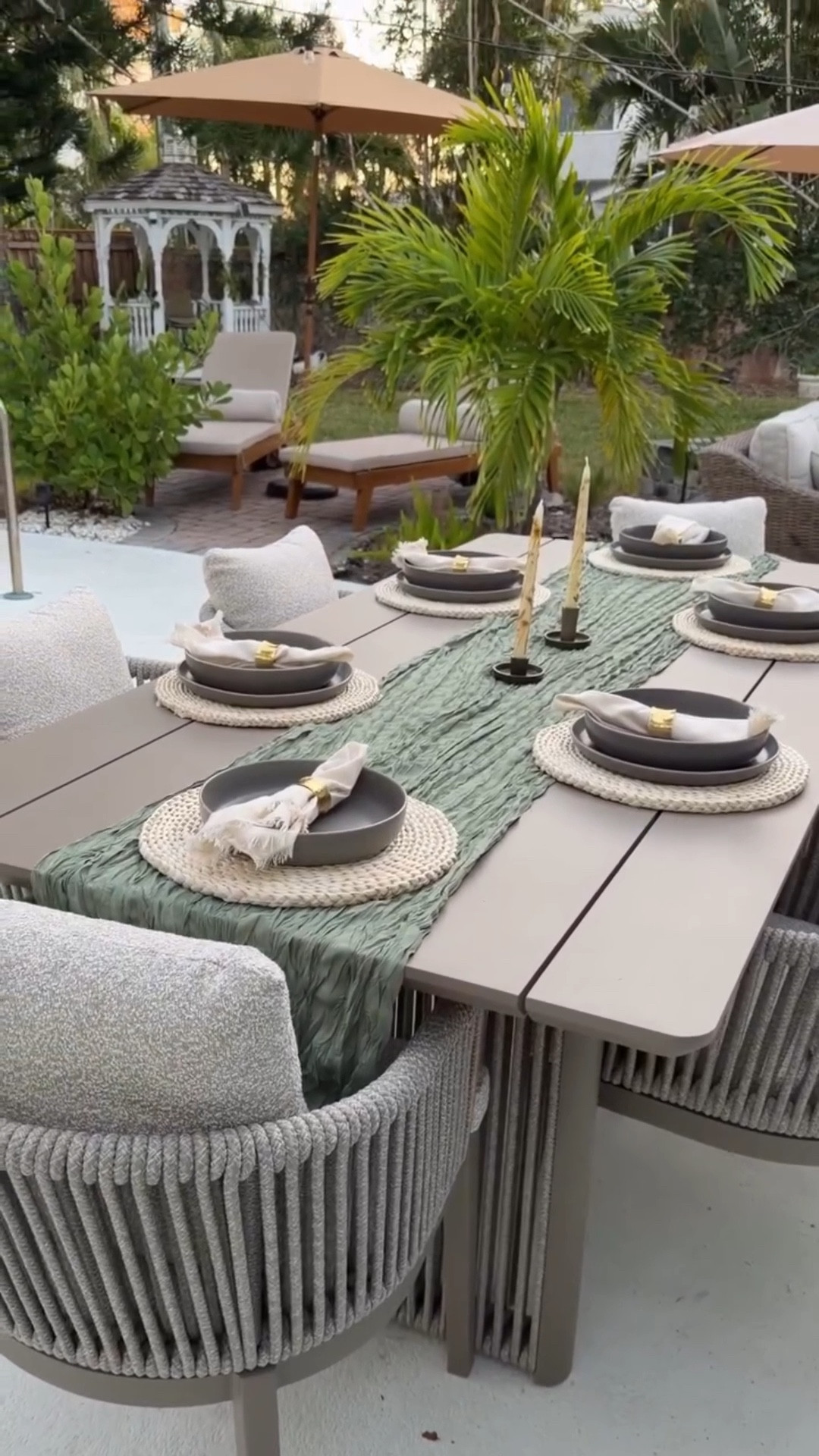 Enjoying that extra hour of daylight in my backyard!! 🥰🌴 First time doing a table scape on my new Amazon table, how did I do?! 🥹 comment HOME for table & decor 🔗’s! @purpleleafgarden 

#outdoorfurniture #homedecor #patiodecor #diyhomeprojects #homeupgrades