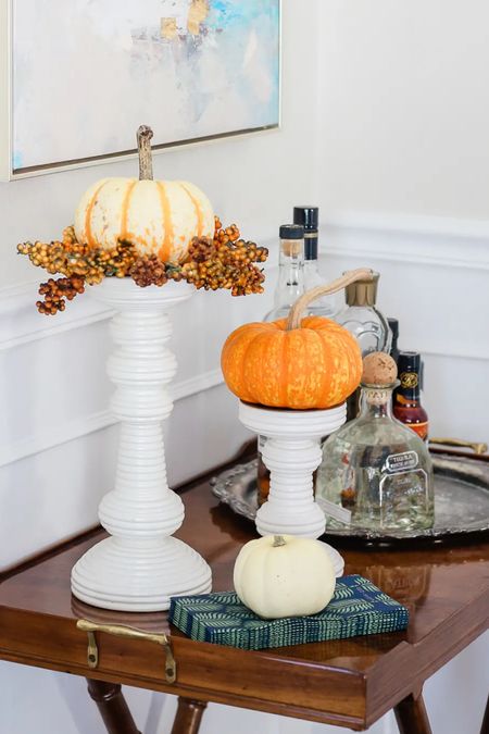 Sculptural and textural, these candlesticks make unique centerpieces and can dress up a table or mantel in no time flat. Add pumpkins 🎃 for Fall and transition to holiday with red pillars! 

#serenaandlily #candlesticks #falldecor #fallmantel

#LTKHalloween