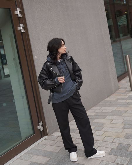 hoodie by Anine bing 
black pants by the frankie shop 
trainers by fit flop 
white tee by cos 
leather jacket by ducie 
casual outfit ideas 

#LTKworkwear #LTKeurope #LTKstyletip